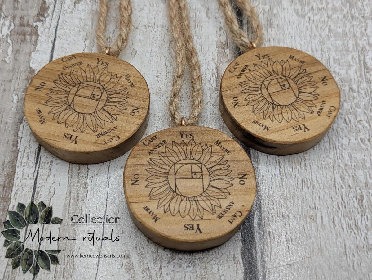 Tulip wood mini pocket pendulum board with sunflower design.