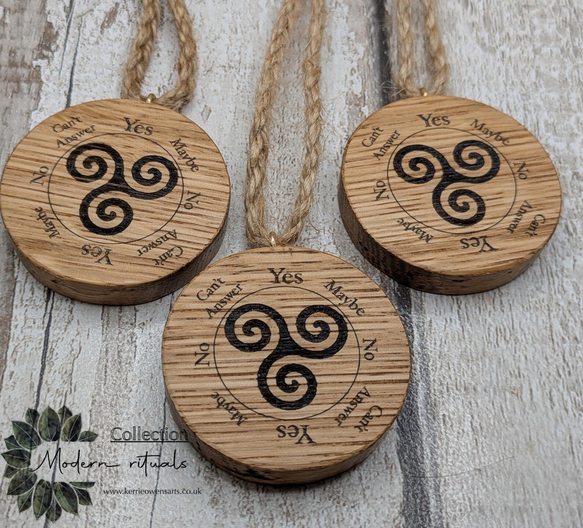 Oak wood mini pocket pendulum boards with triskele design.