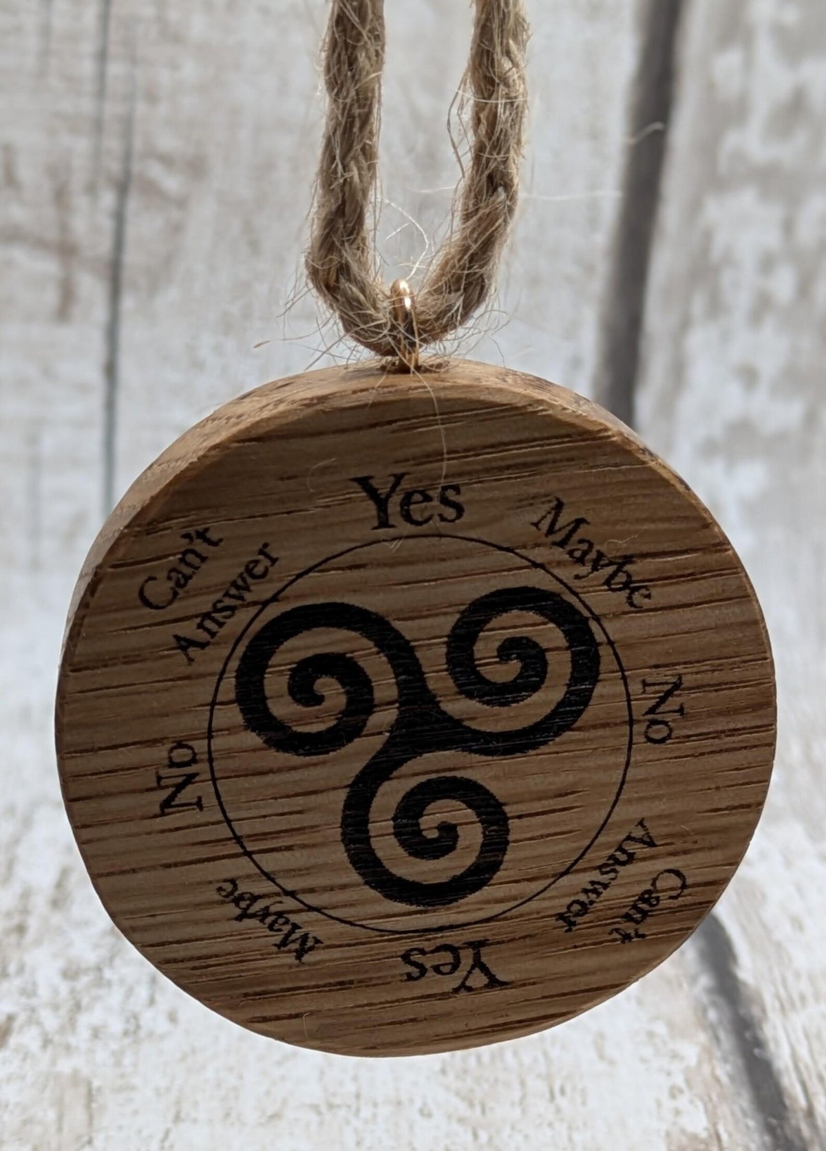 Oak wood mini pocket pendulum boards with triskele design.
