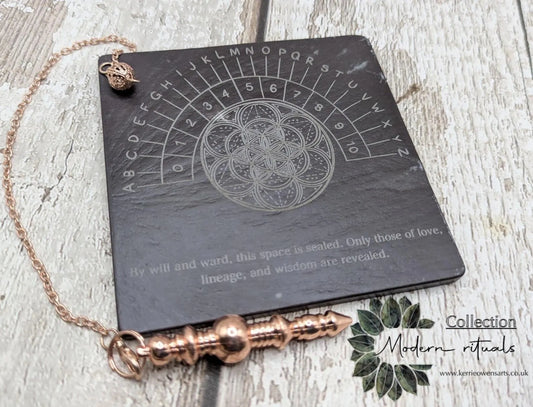 Welsh slate pendulum dowsing board with geometric print.