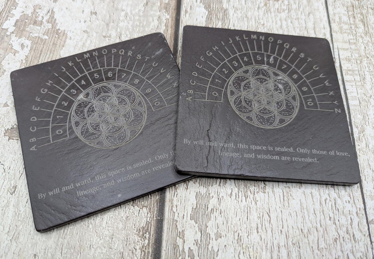 Welsh slate pendulum dowsing board with geometric print.