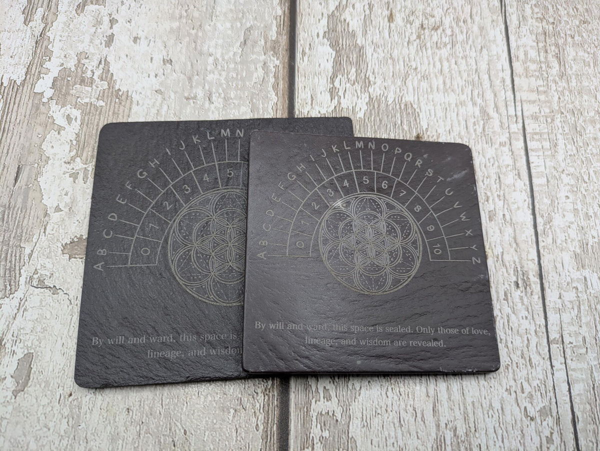 Welsh slate pendulum dowsing board with geometric print.