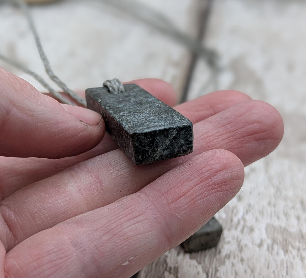 One preselli bluestone offcut simple pendant.