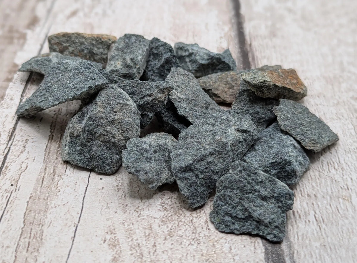 Single raw chunk of preseli bluestone mineral.