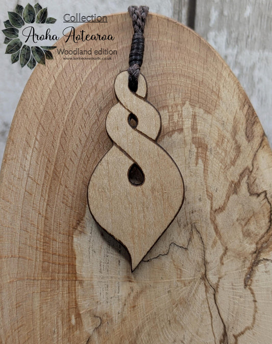 Lime wood, laser printed and cut pikorua pendant.