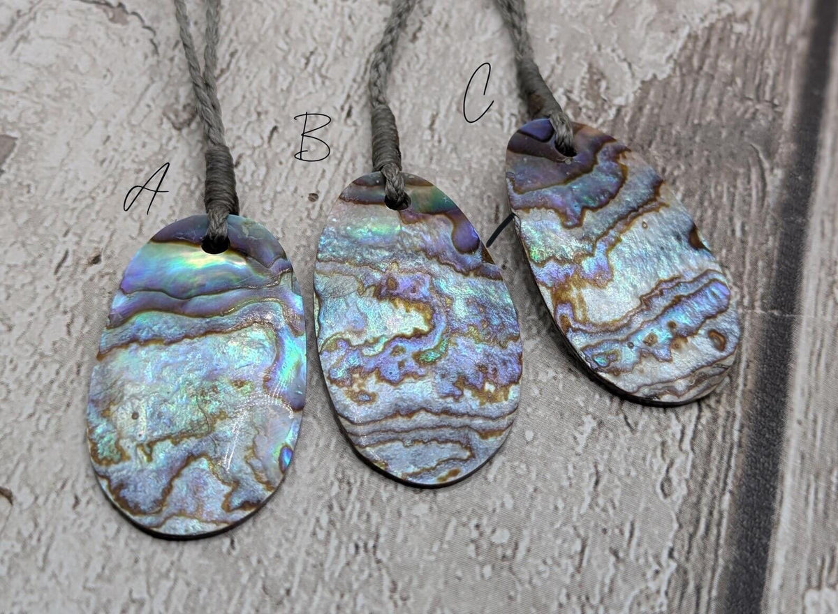 New Zealand rainbow paua abalone shell tumbled offcut unisex pendant.