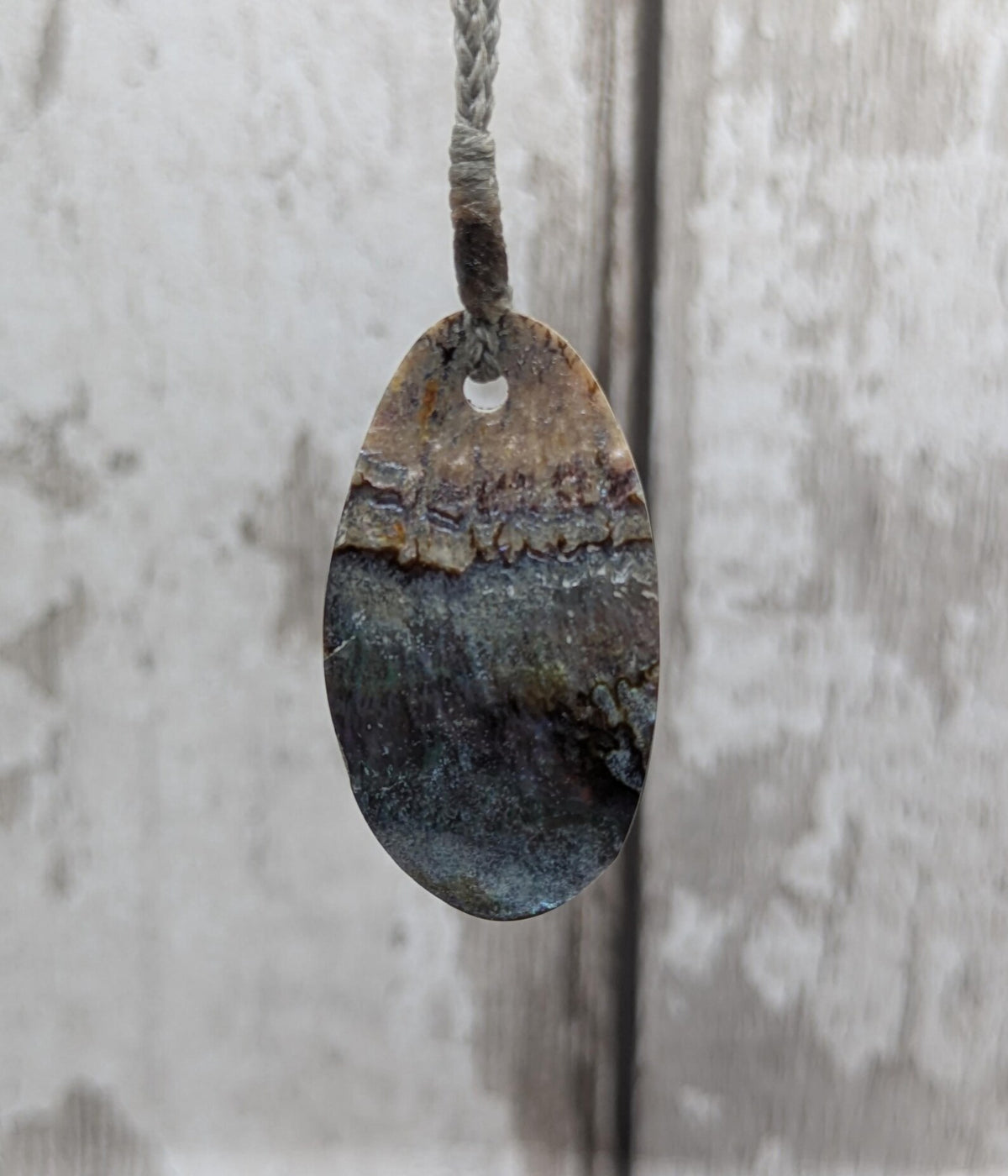 New Zealand rainbow paua abalone shell tumbled offcut unisex pendant.