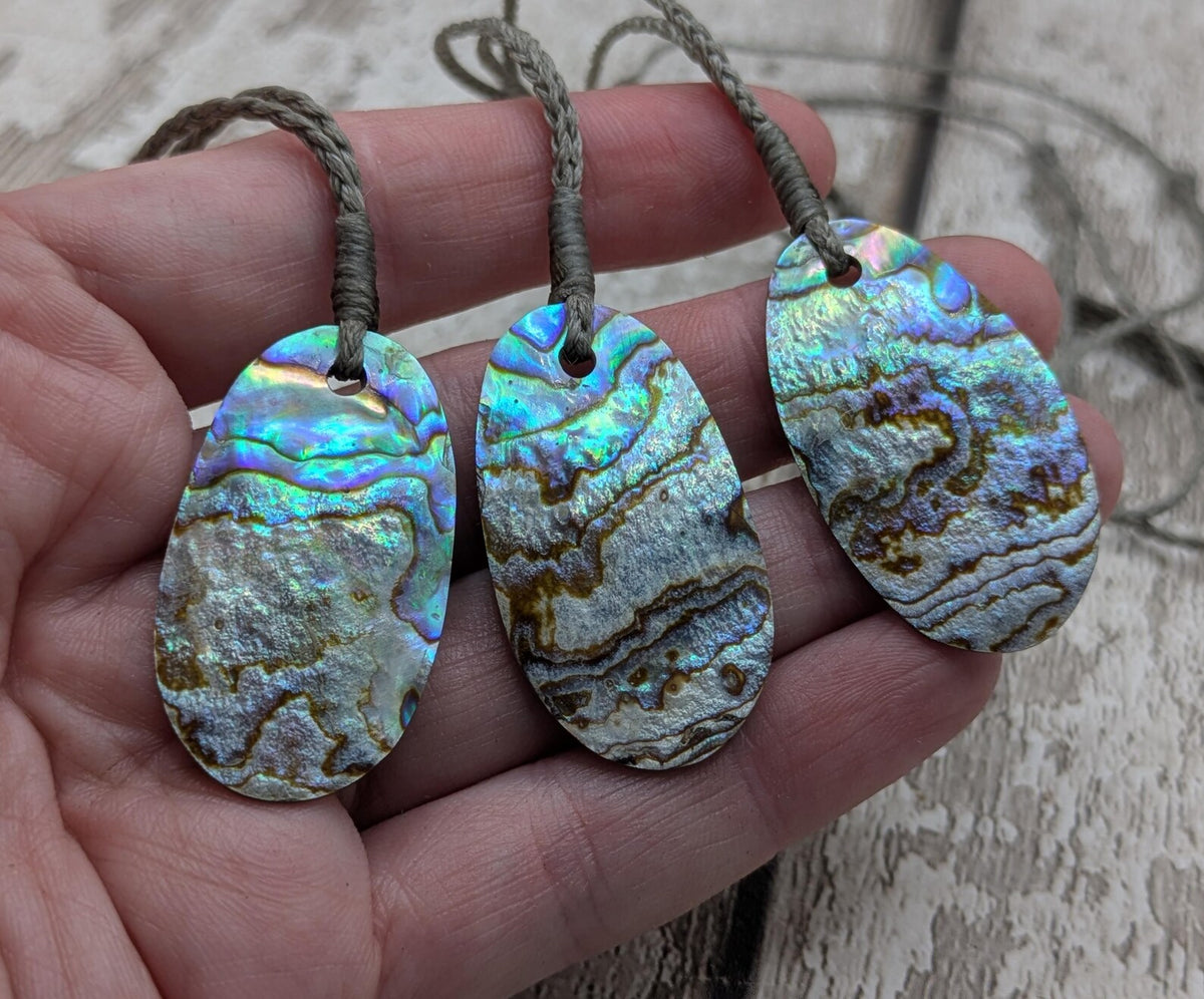 New Zealand rainbow paua abalone shell tumbled offcut unisex pendant.