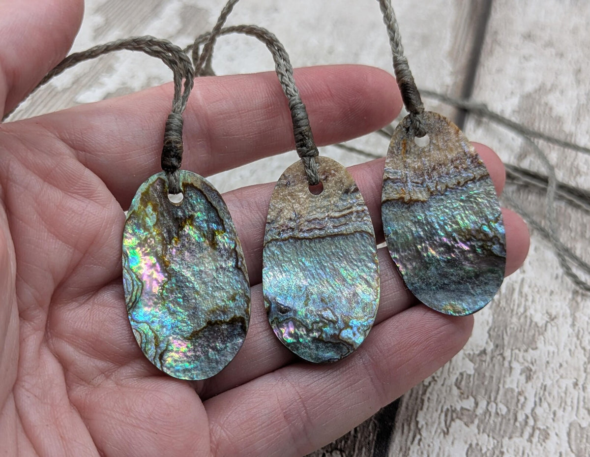 New Zealand rainbow paua abalone shell tumbled offcut unisex pendant.