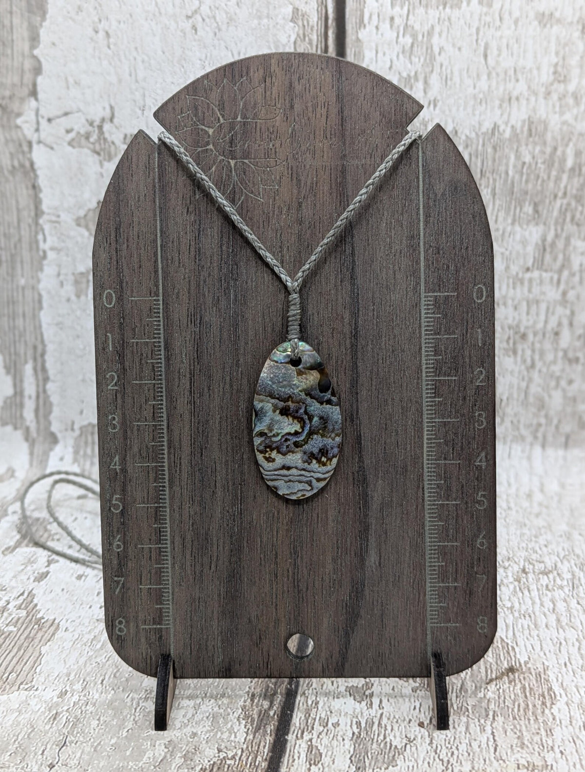 New Zealand rainbow paua abalone shell tumbled offcut unisex pendant.