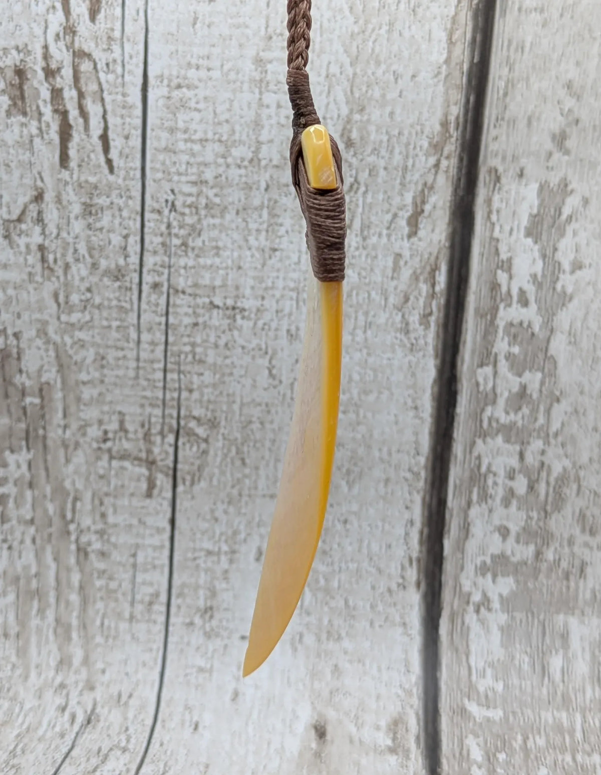Mother of pearl hei toki adze pendant.