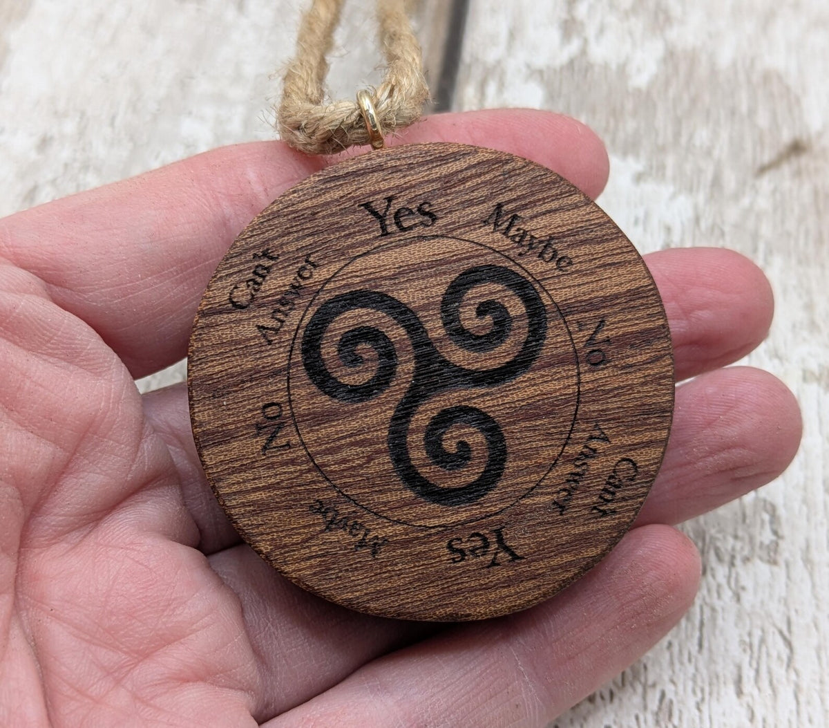 Sepele mahogany mini pocket sized pendulum boards with triskele design.
