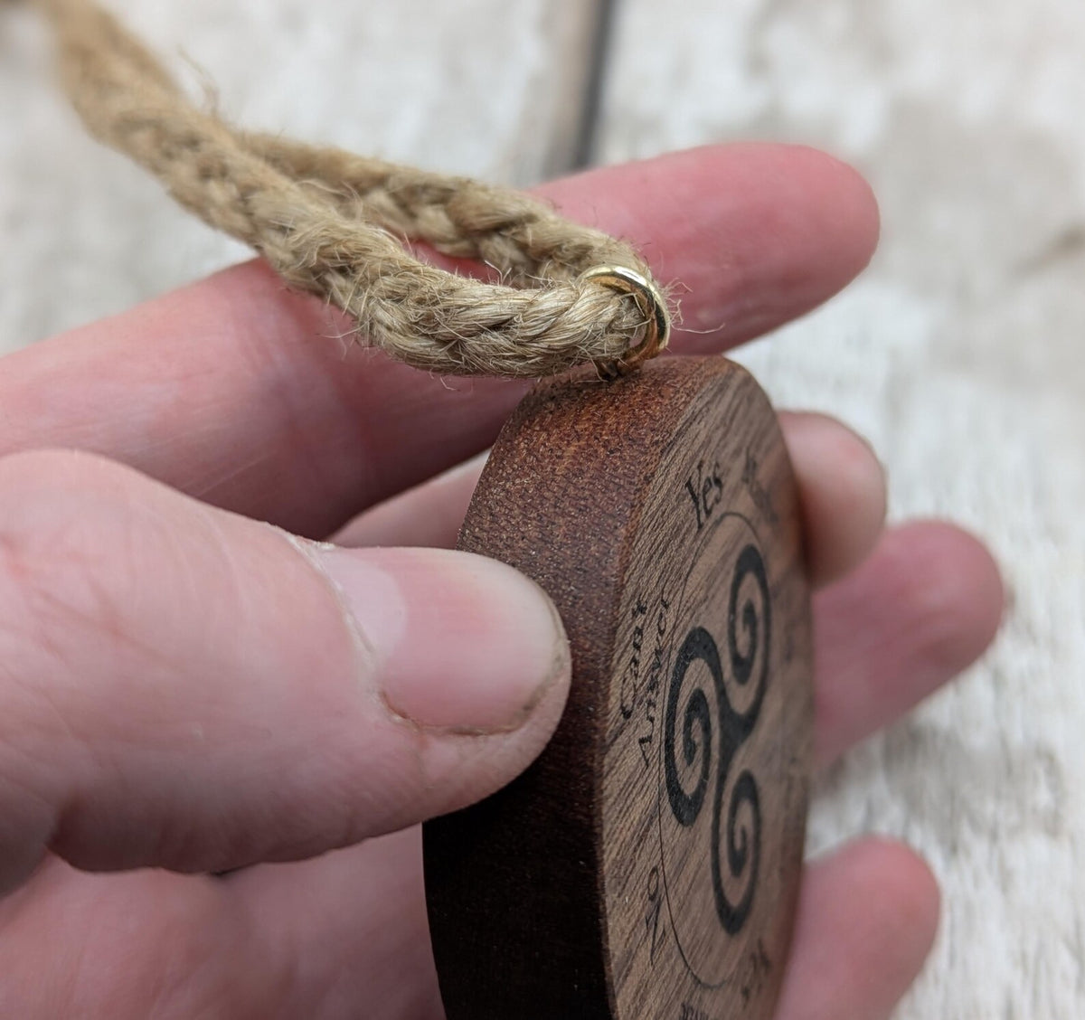 Sepele mahogany mini pocket sized pendulum boards with triskele design.