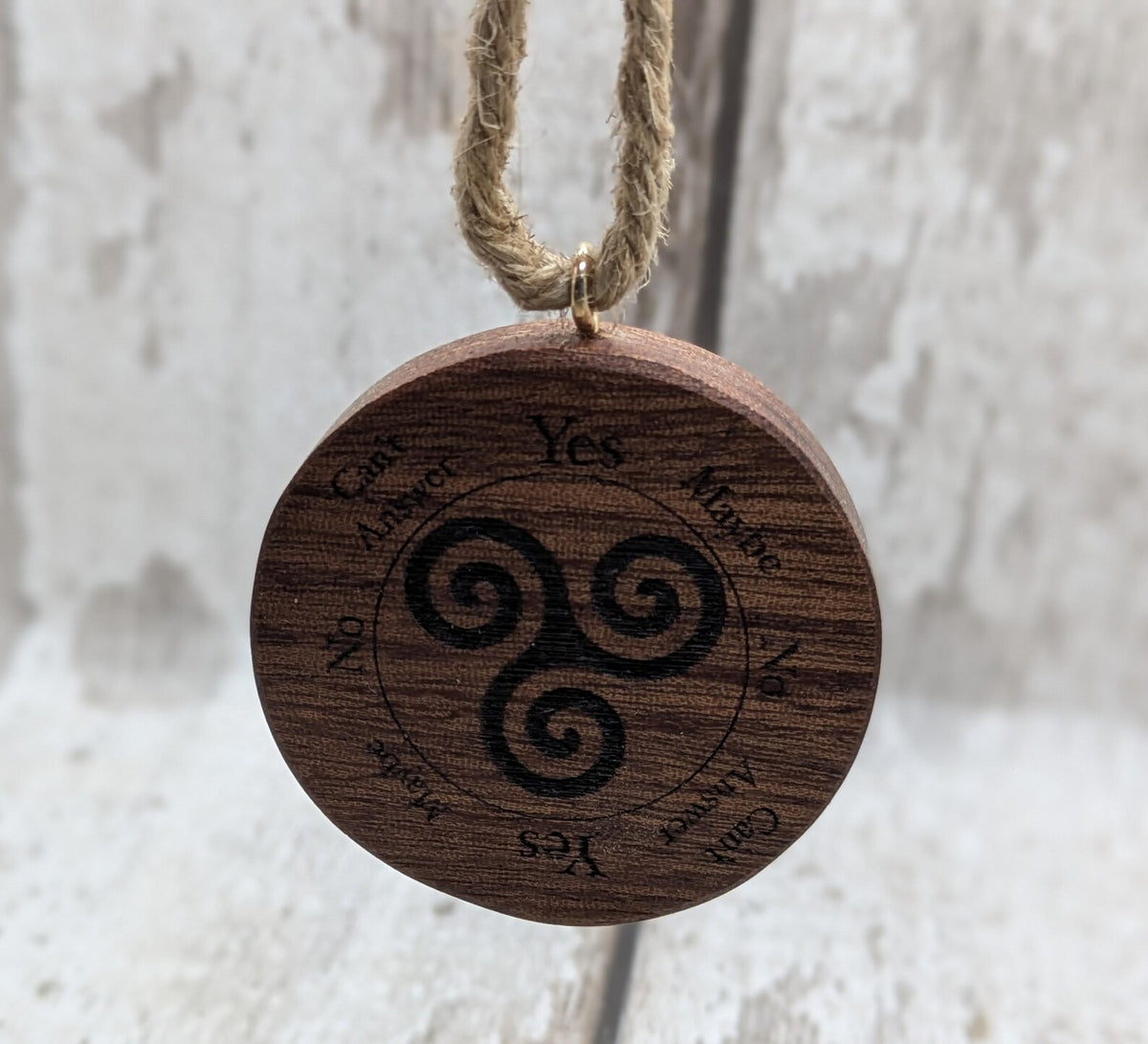 Sepele mahogany mini pocket sized pendulum boards with triskele design.