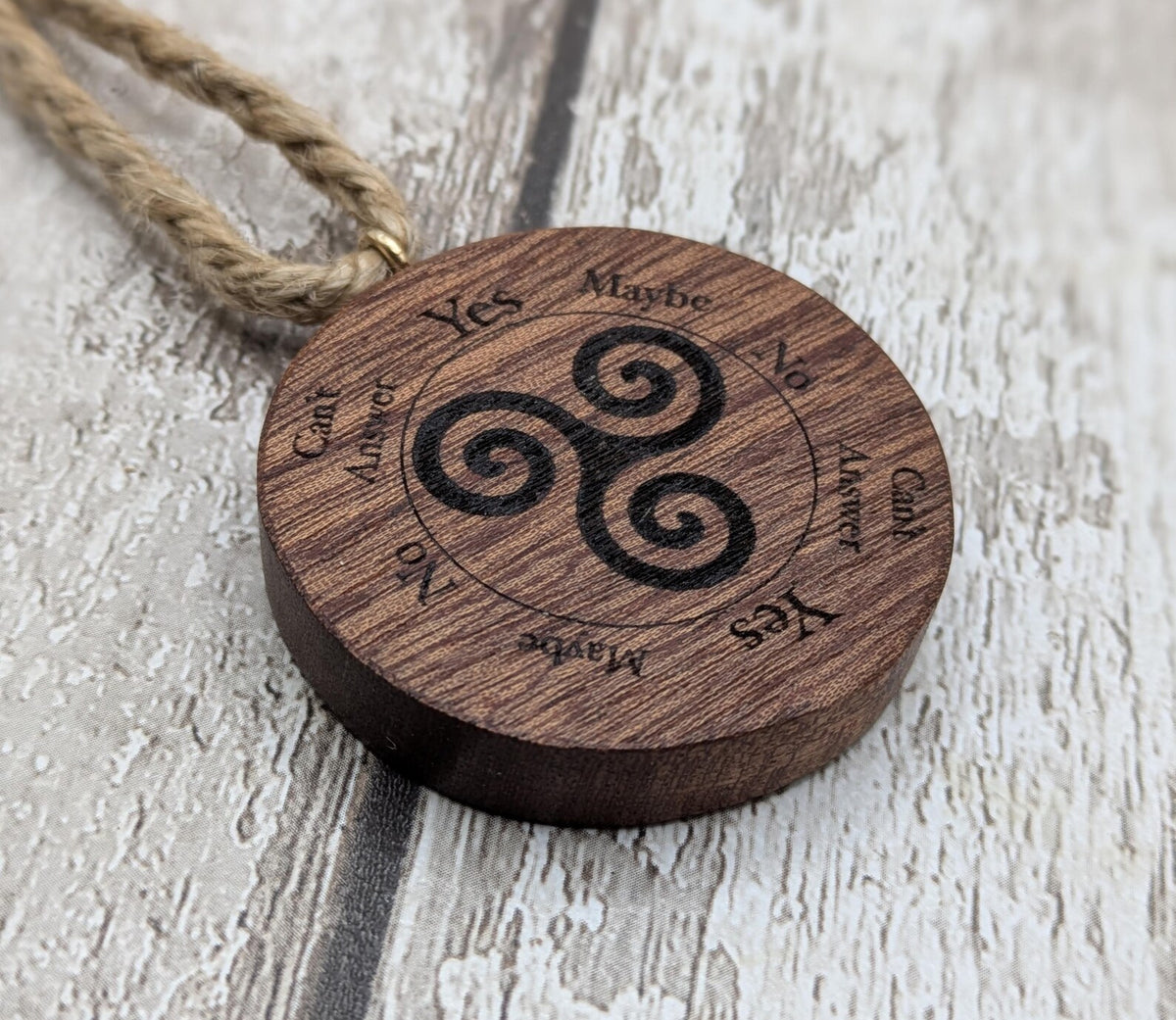 Sepele mahogany mini pocket sized pendulum boards with triskele design.