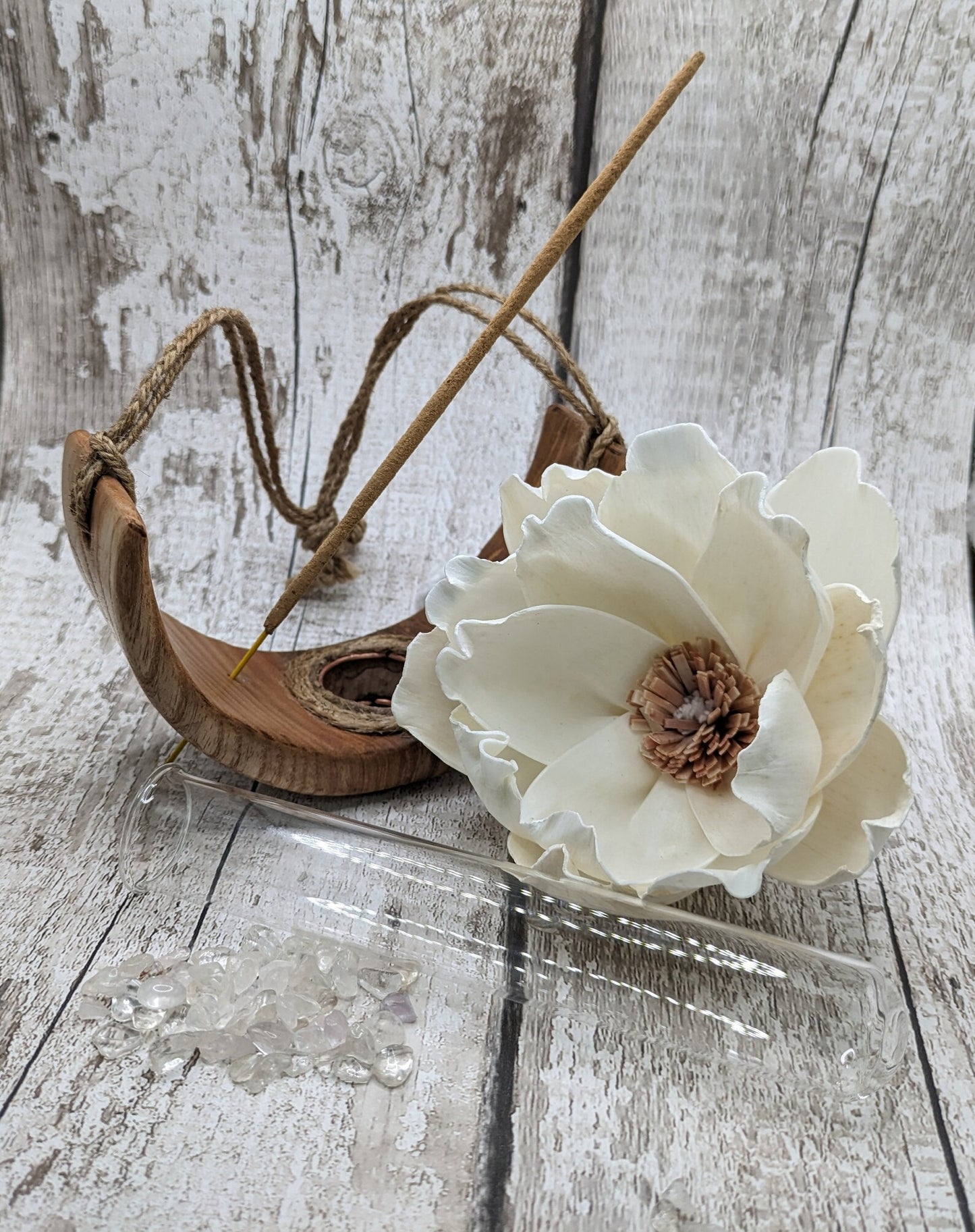 Recycled wooden carved hanging Reed diffuser with sola flower.