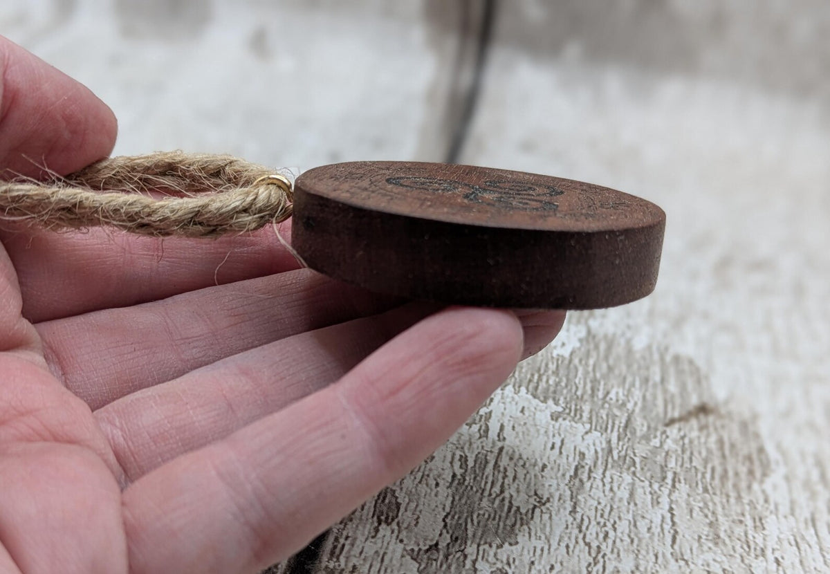 Sepele mahogany mini pocket sized pendulum boards with triskele design.
