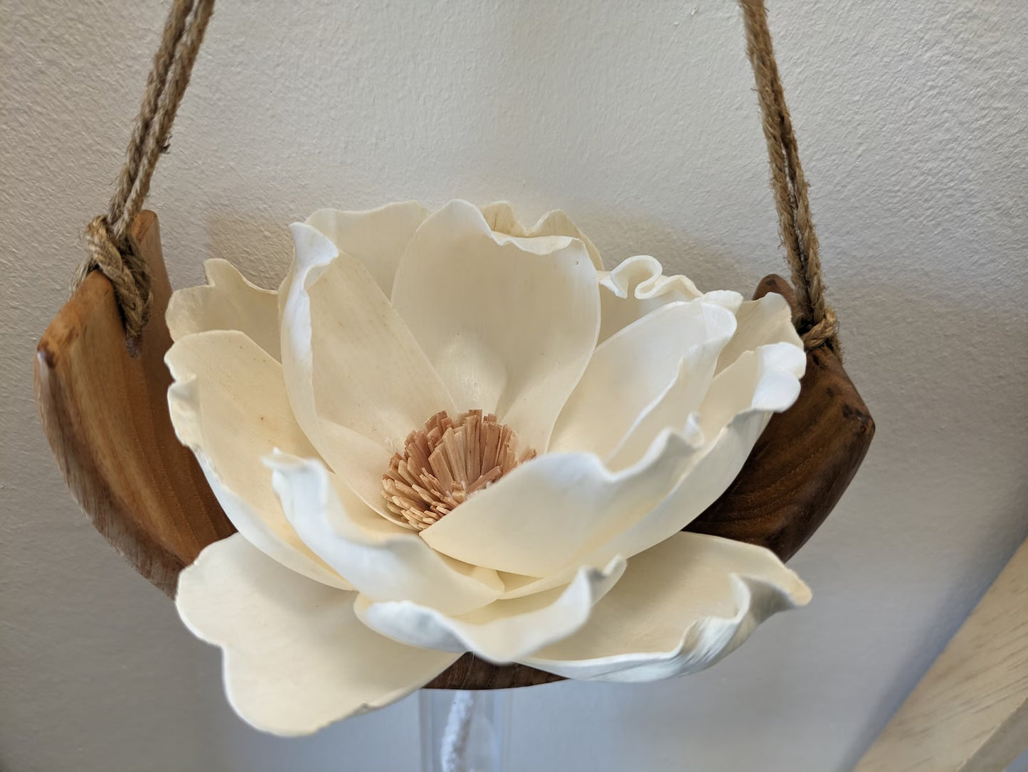 Recycled wooden carved hanging Reed diffuser with sola flower.