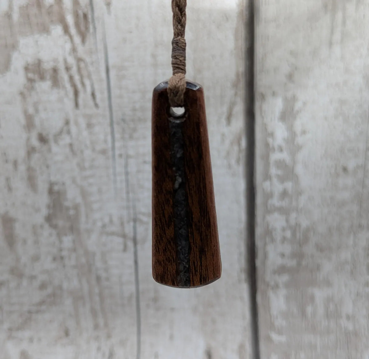 Sepele mahogany roimata and blue kyanite pendant.