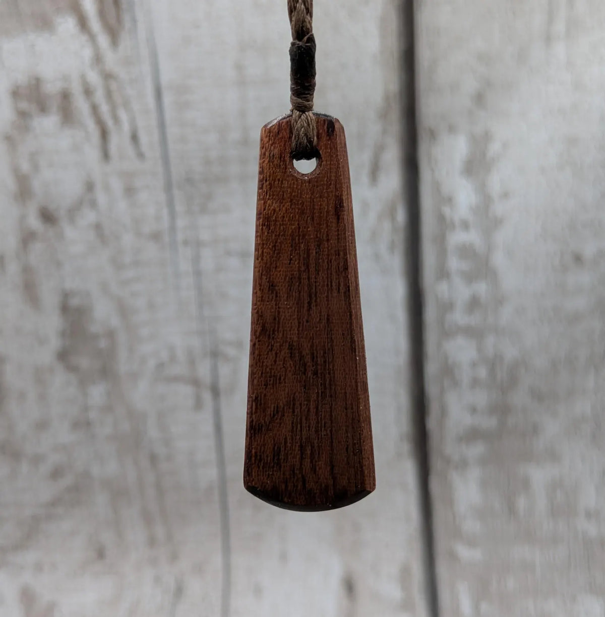 Sepele mahogany roimata and blue kyanite pendant.