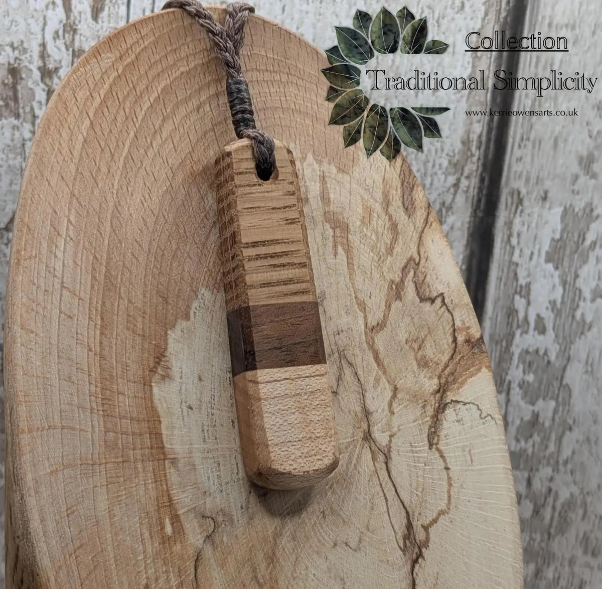 mixed wood roimata teardrop pendant.