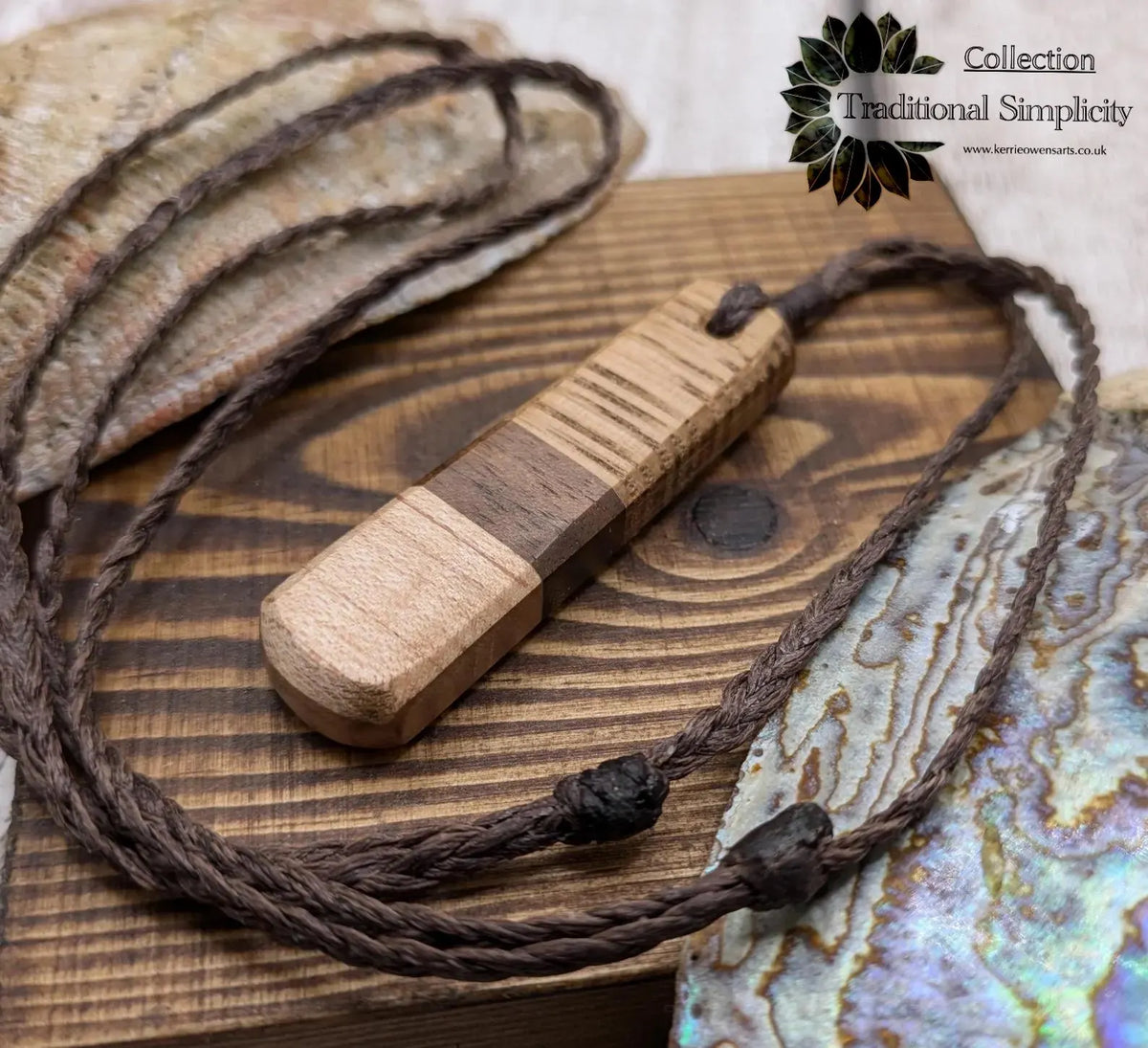 mixed wood roimata teardrop pendant.