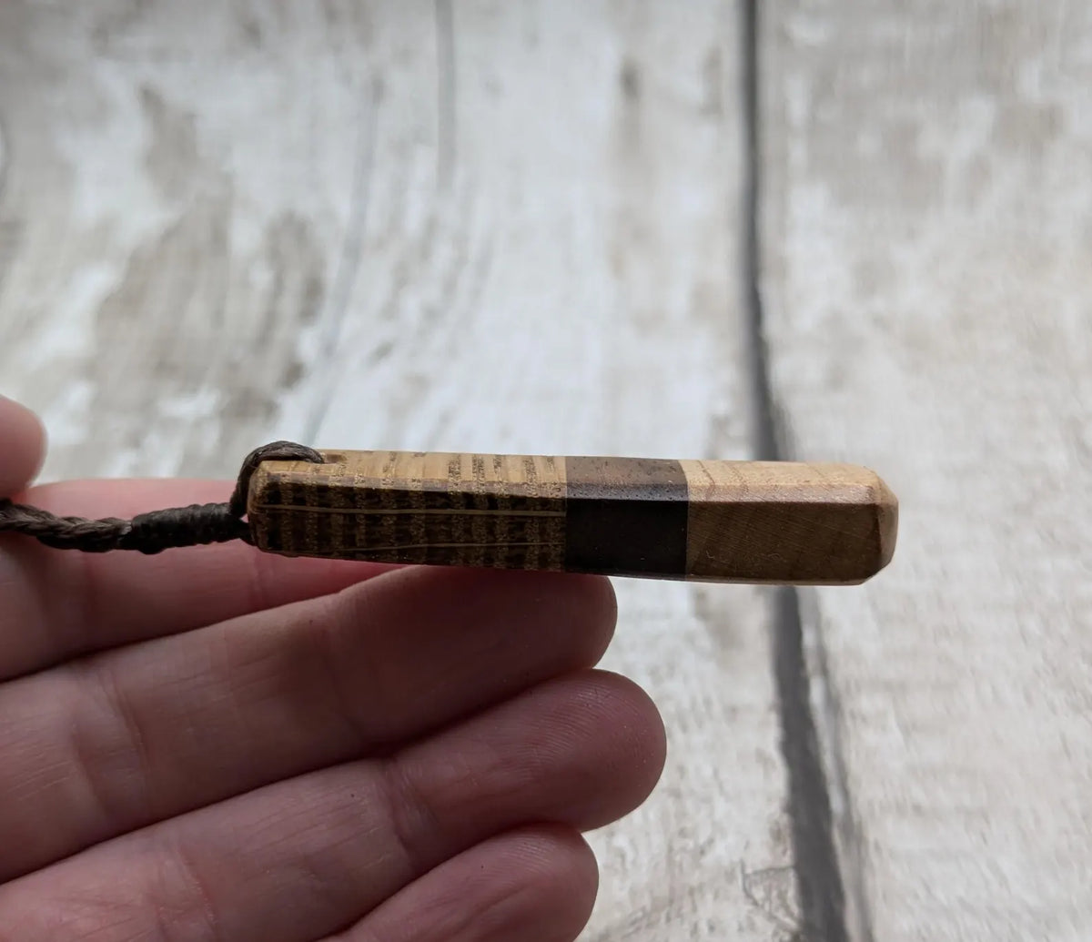 mixed wood roimata teardrop pendant.