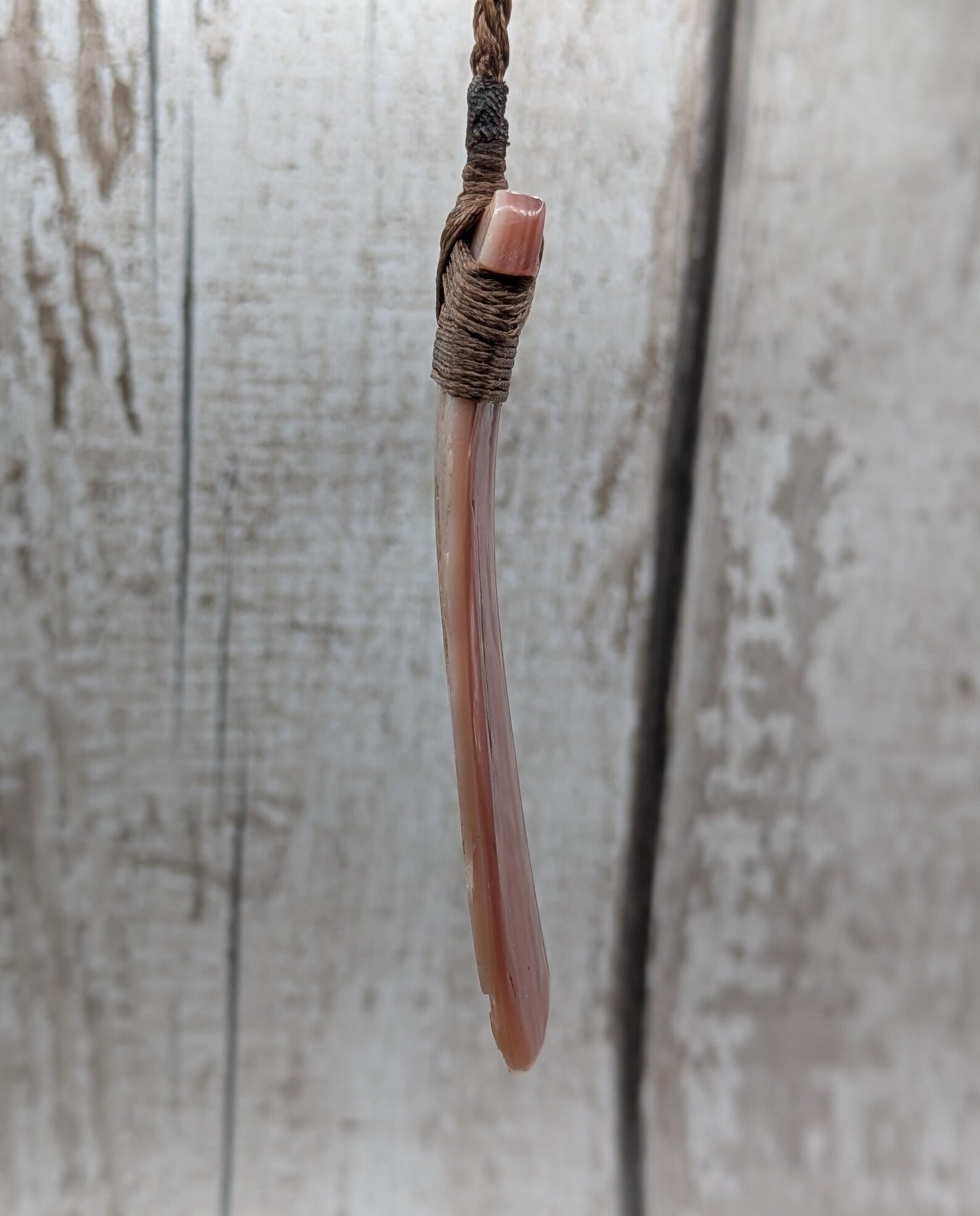 New Zealand freshwater pink mussel shell Hei Toki adze pendant.