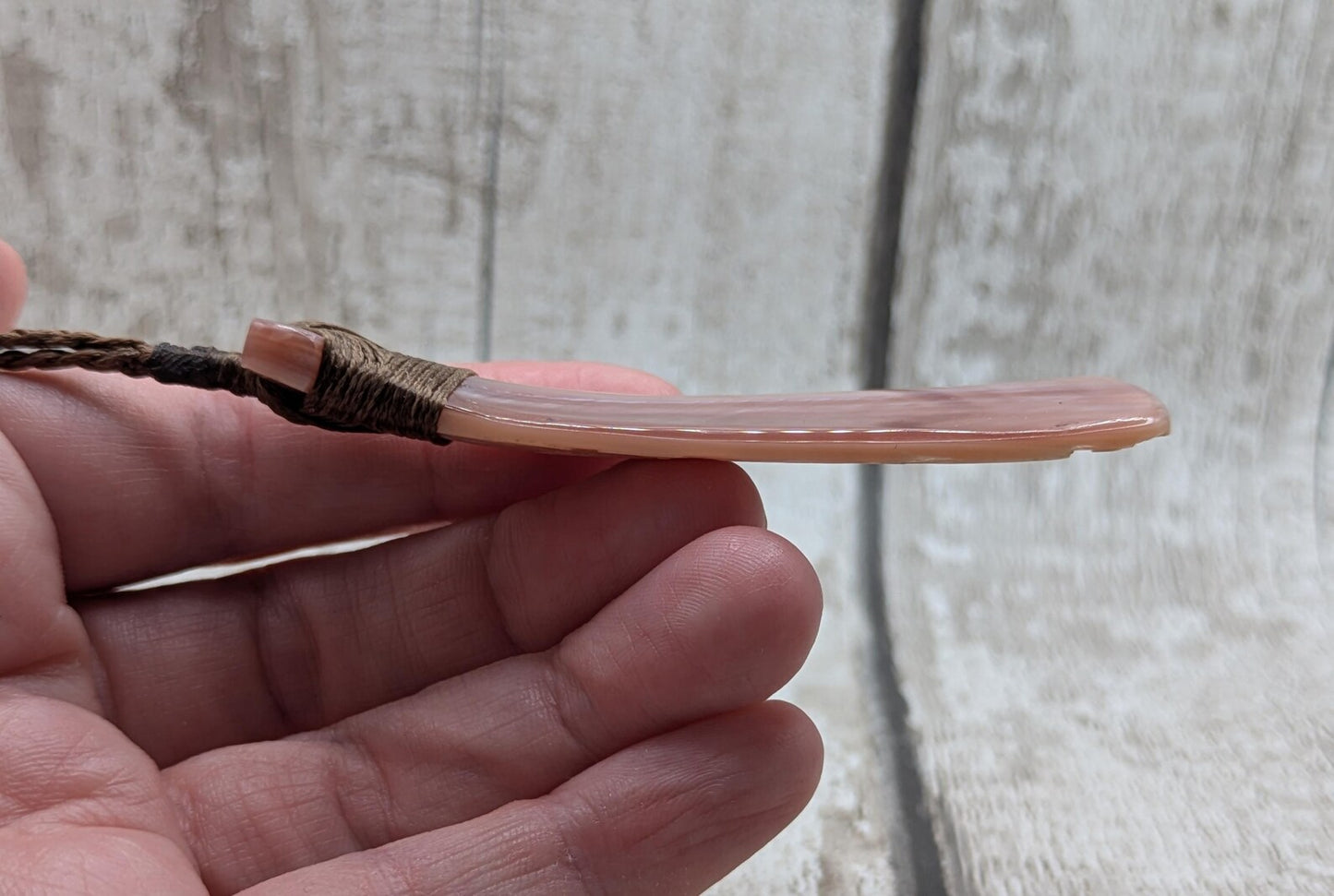 New Zealand freshwater pink mussel shell Hei Toki adze pendant.