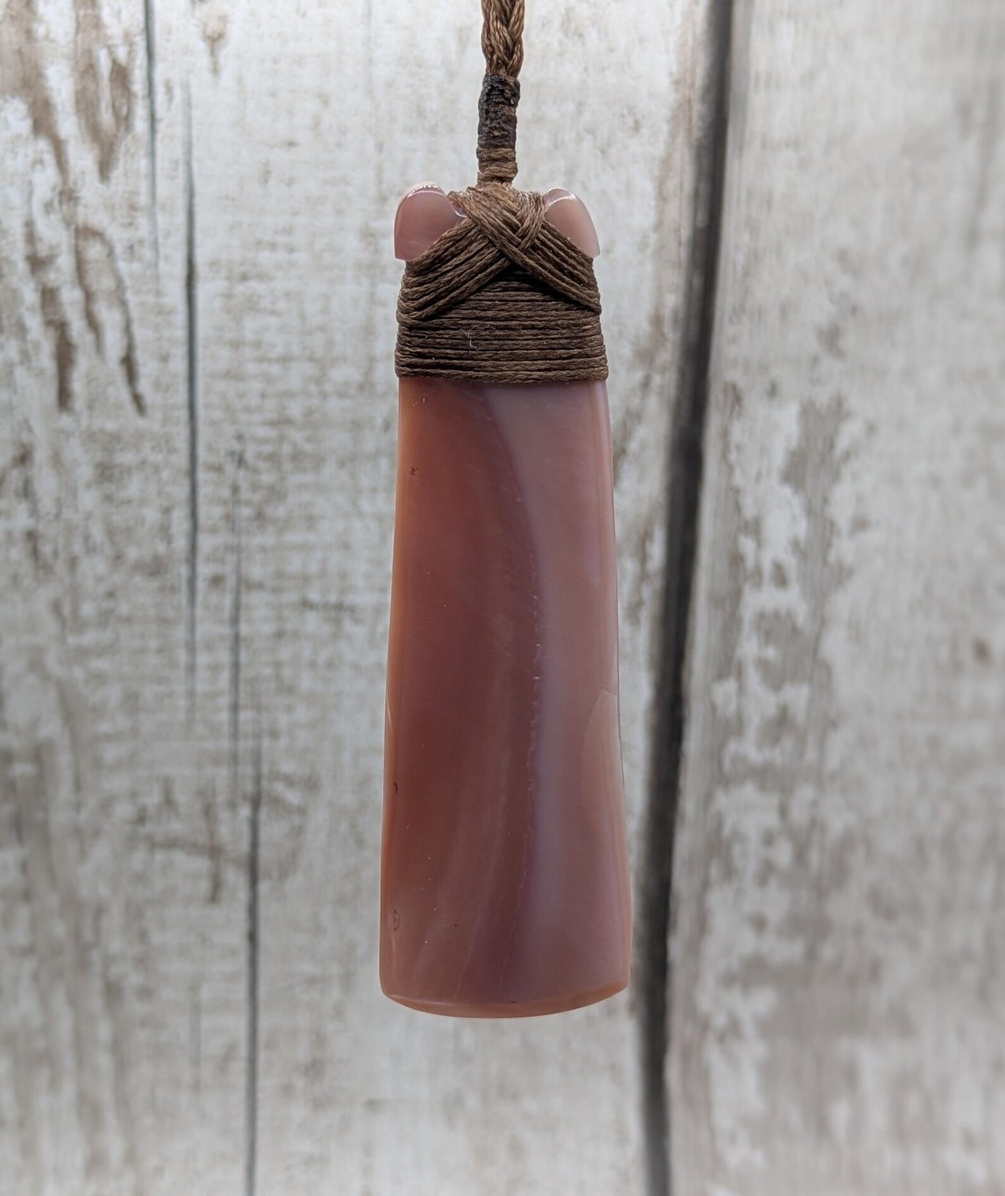 New Zealand freshwater pink mussel shell Hei Toki adze pendant.