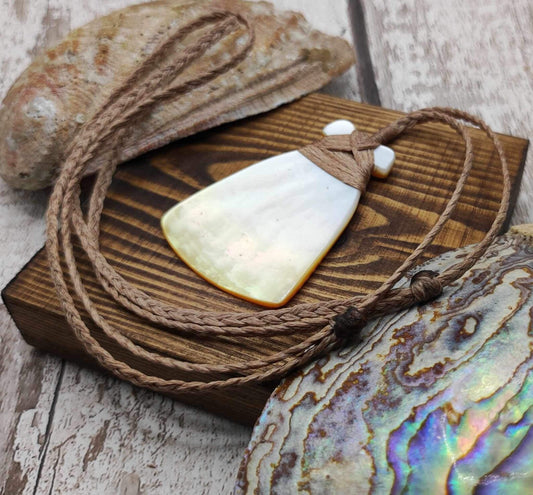 Mother of Pearl Hei Toki adze pendant.