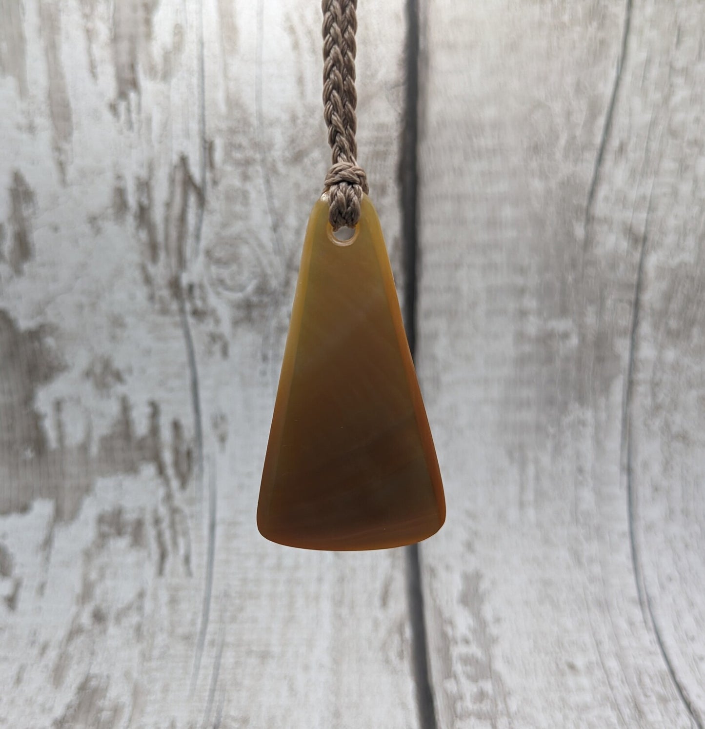 Mother of Pearl triangular pendant.