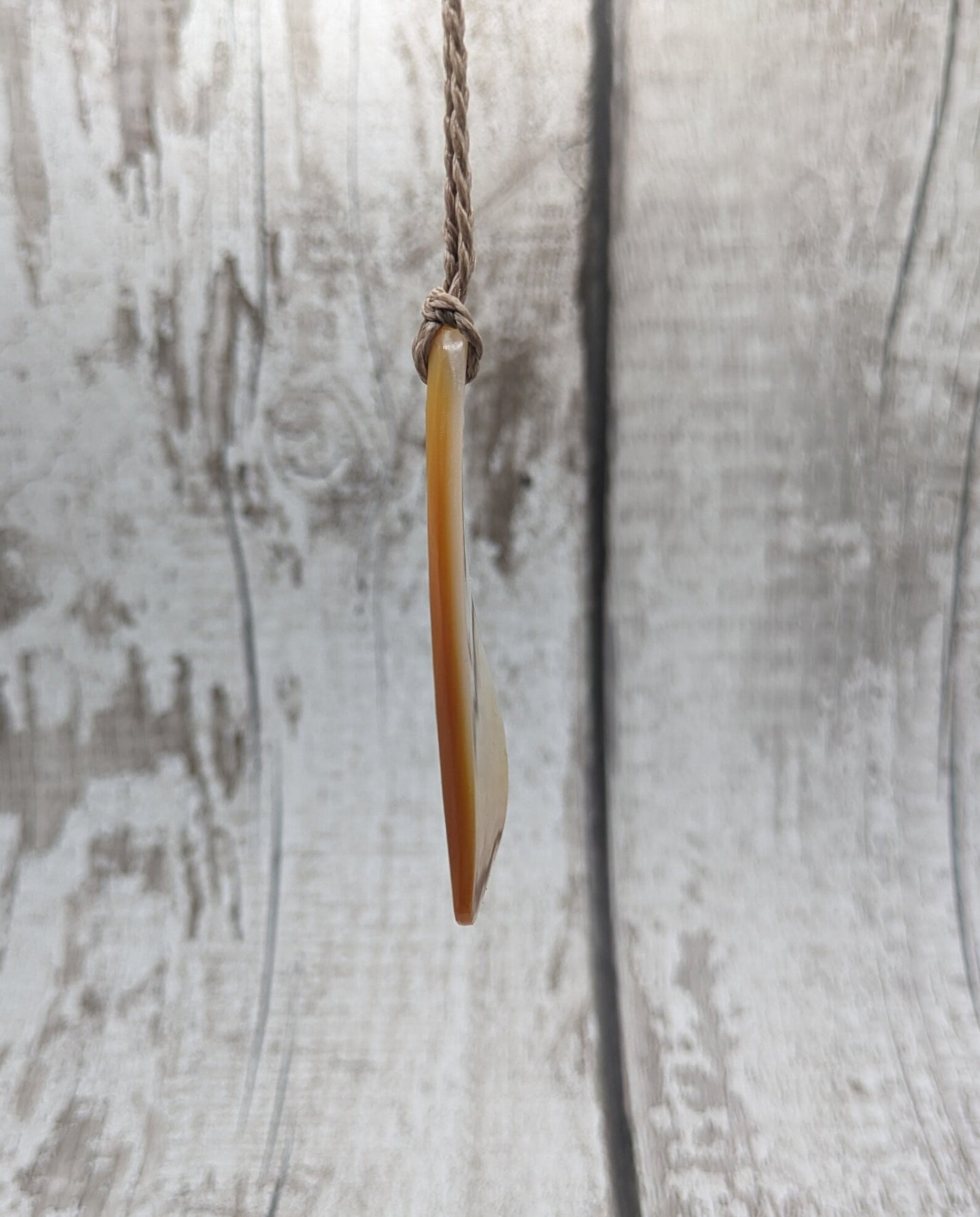 Mother of Pearl triangular pendant.