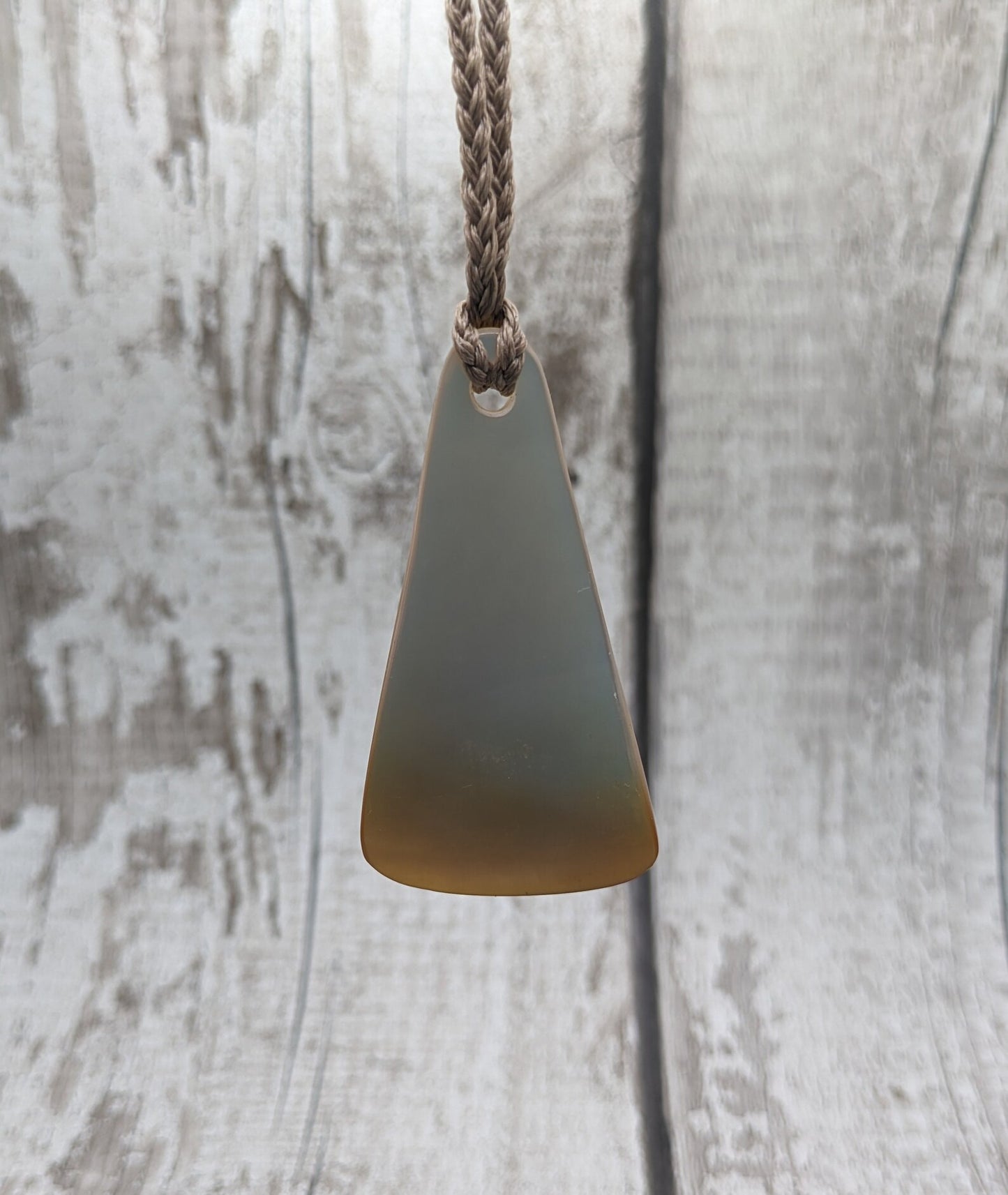 Mother of Pearl triangular pendant.