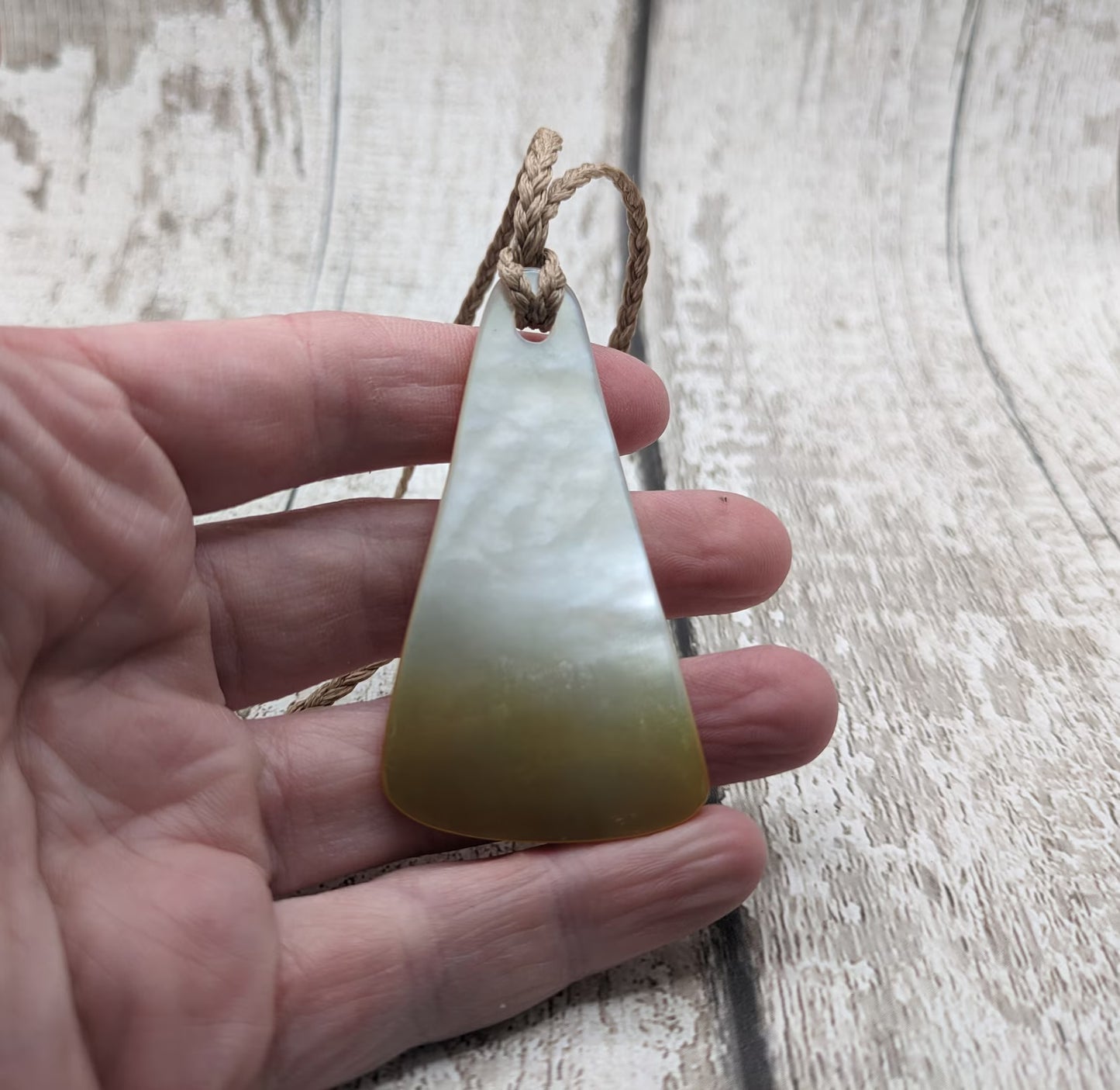 Mother of Pearl triangular pendant.