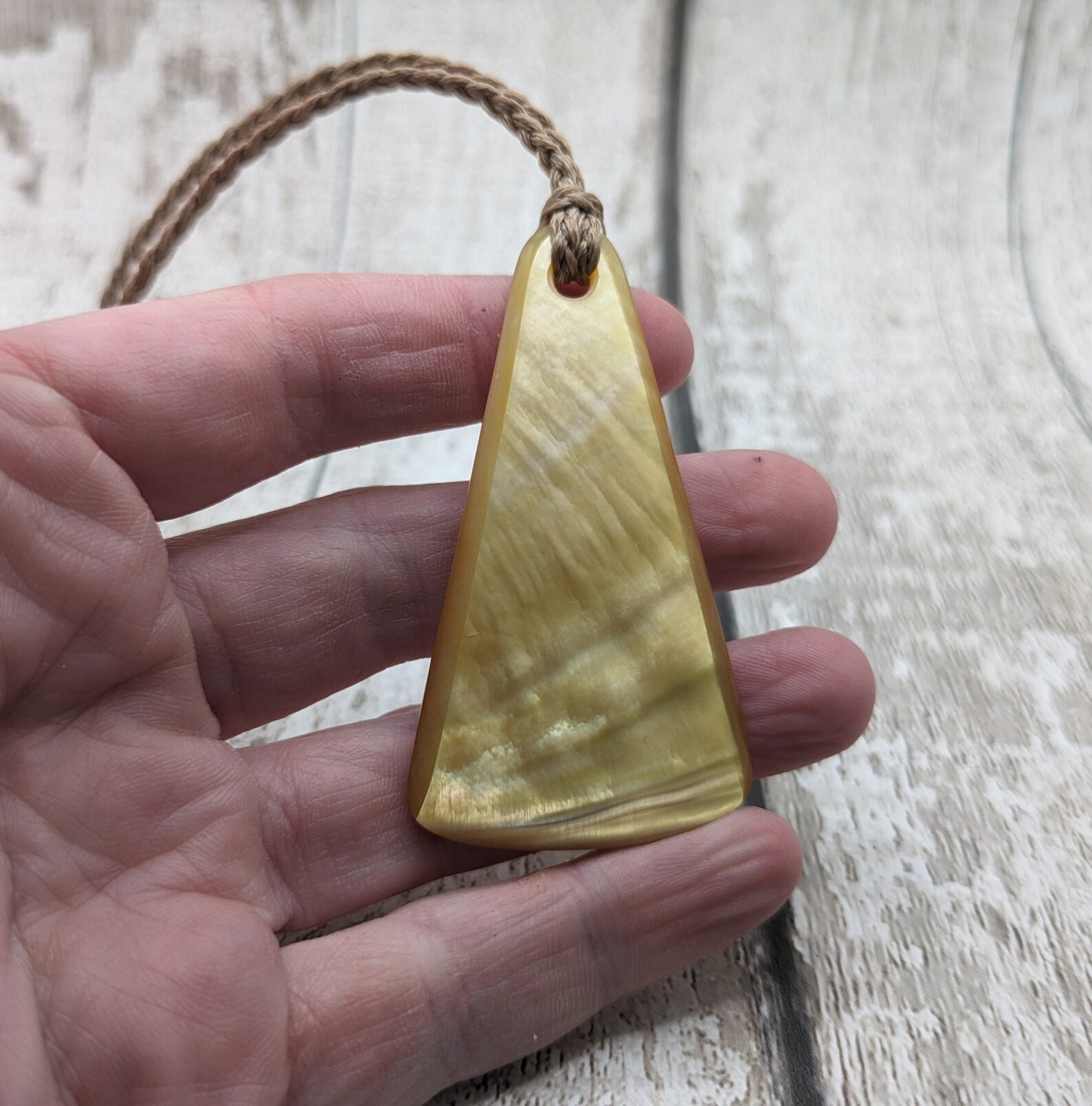 Mother of Pearl triangular pendant.