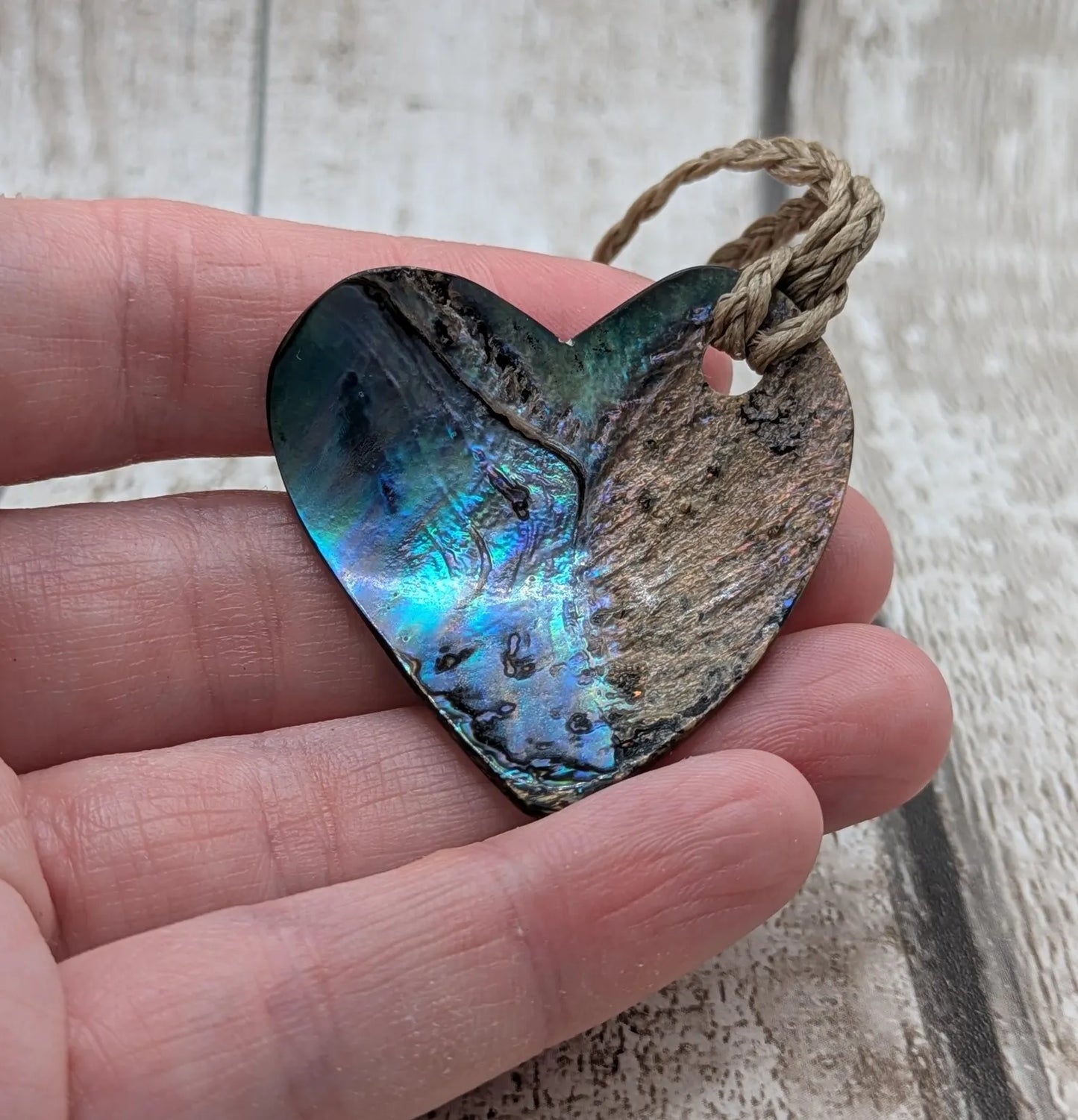 New Zealand wild rainbow Pāua abalone heart pendant.