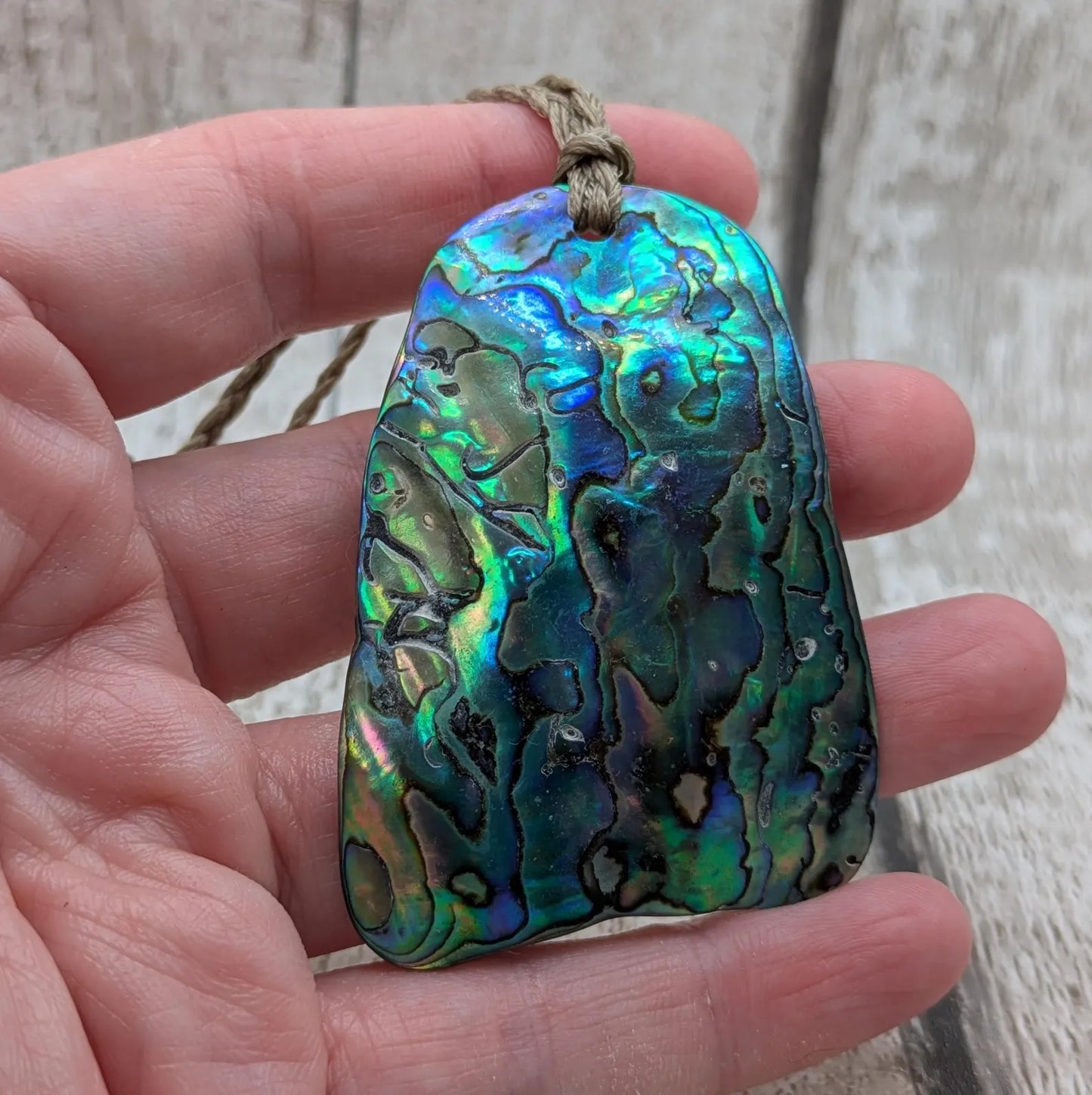 Wild New Zealand beach combed free form rainbow Pāua pendant