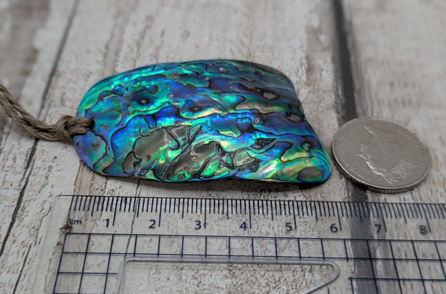 Wild New Zealand beach combed free form rainbow Pāua pendant