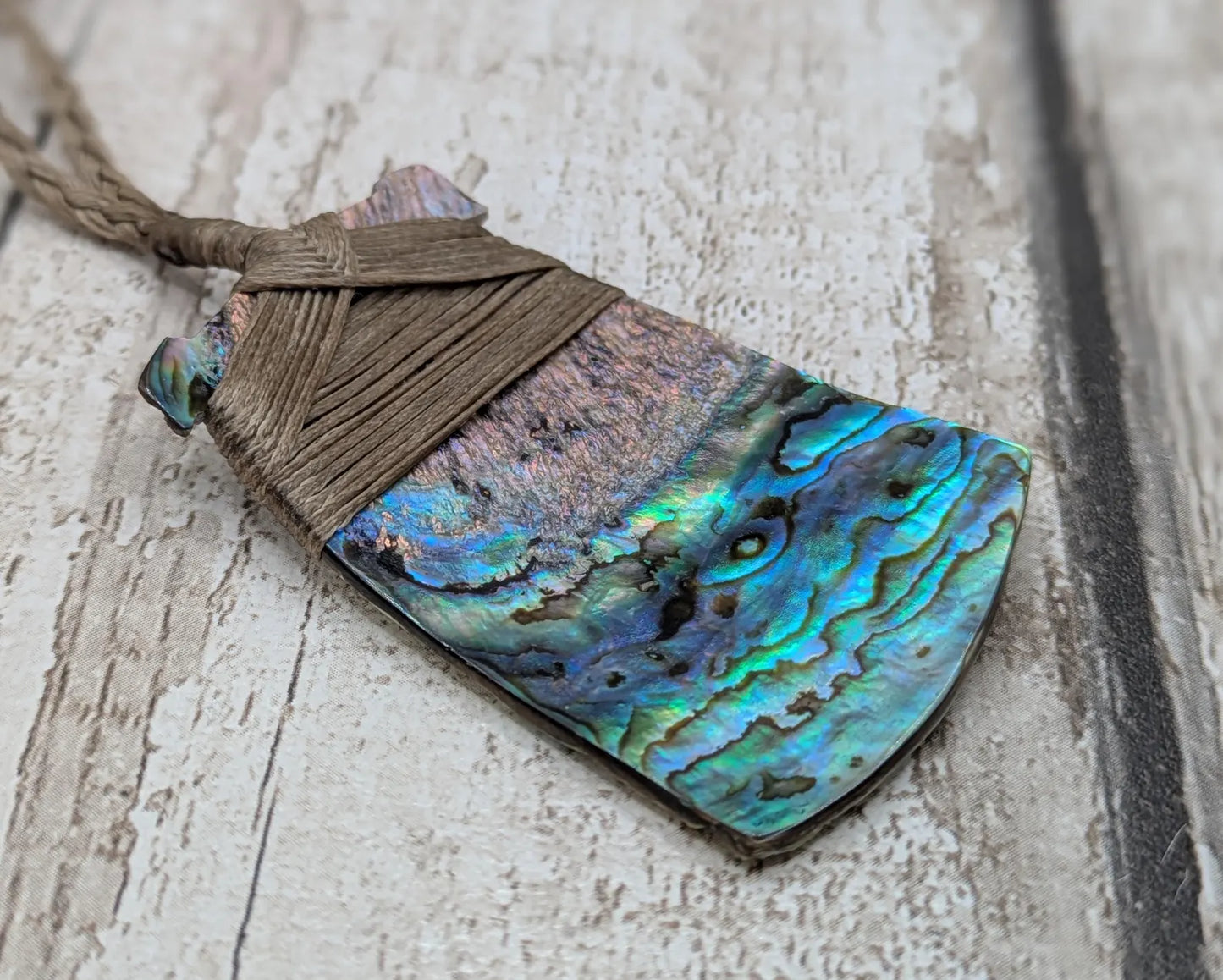 Wild New Zealand freshwater Pāua shell Hei Toki adze pendant
