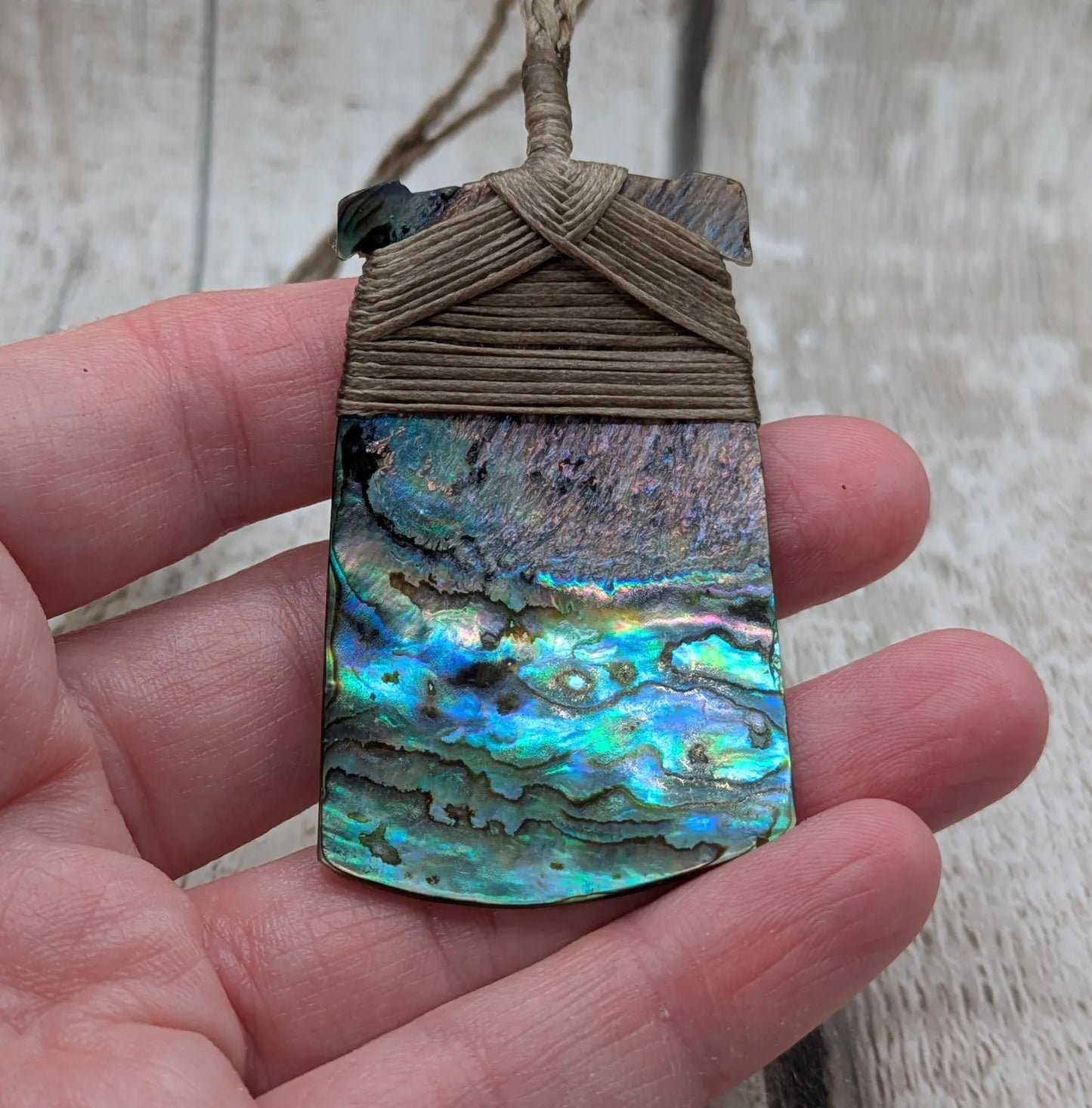 Wild New Zealand freshwater Pāua shell Hei Toki adze pendant