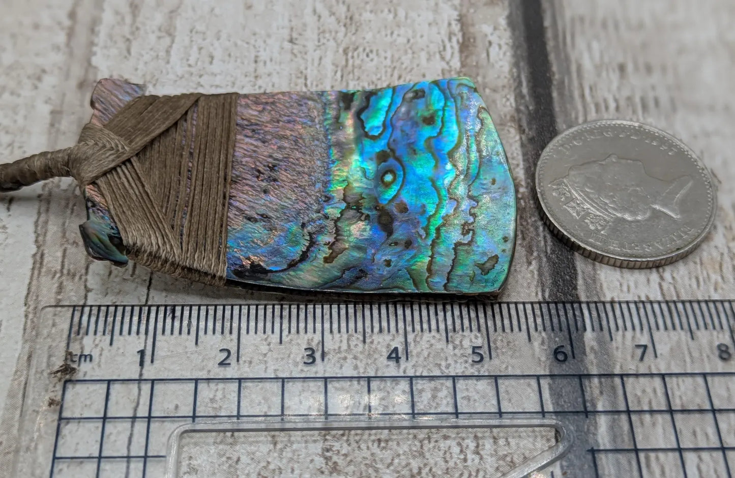 Wild New Zealand freshwater Pāua shell Hei Toki adze pendant