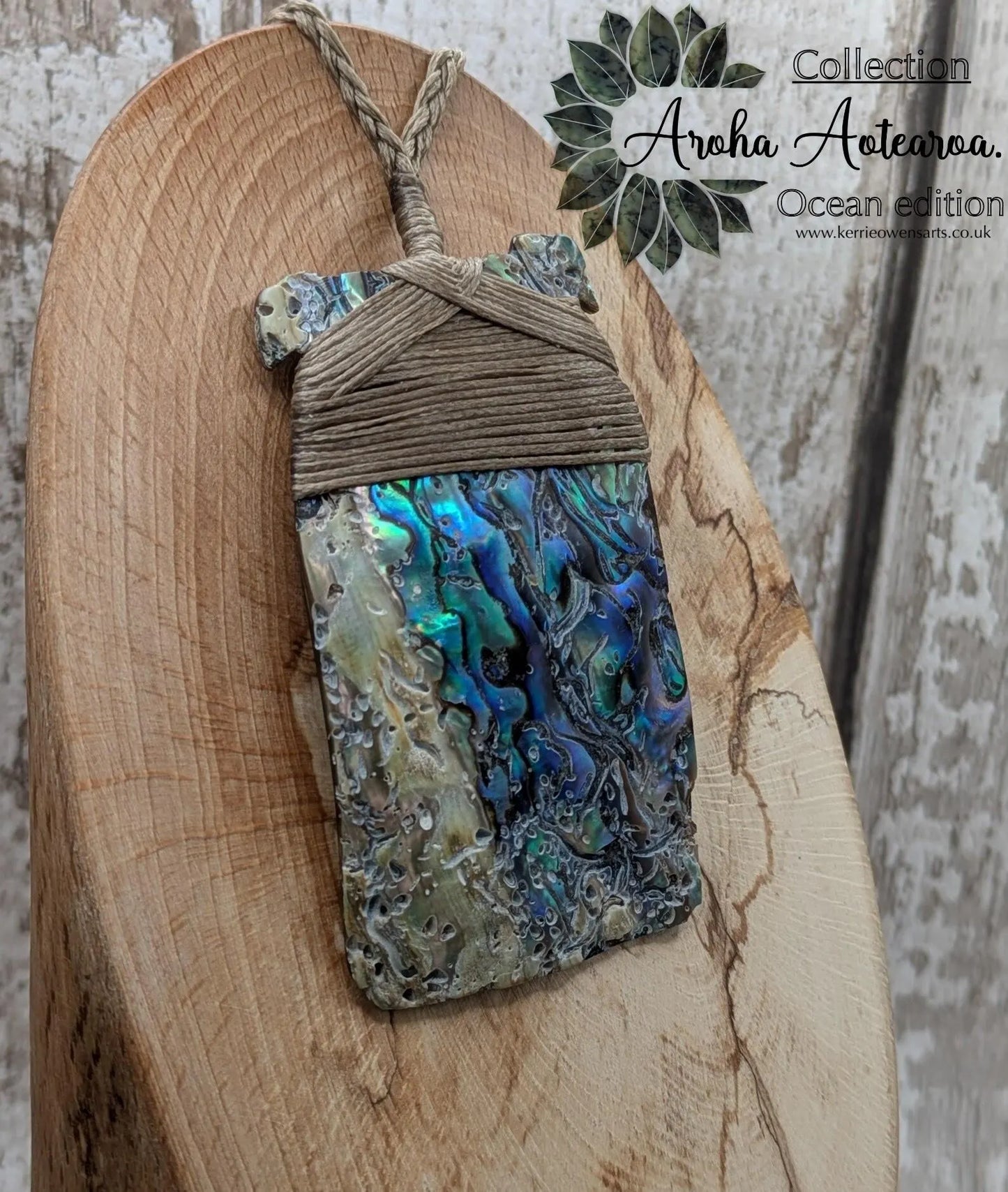 Wild New Zealand rainbow Pāua Hei Toki adze pendant