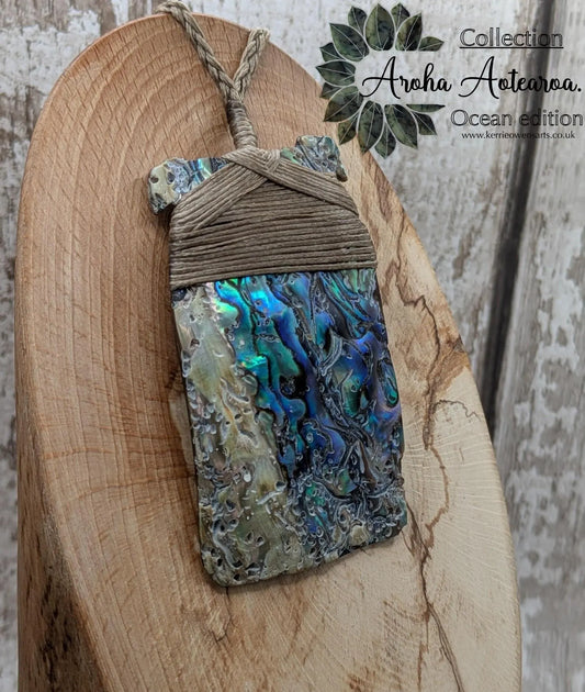 Wild New Zealand rainbow Pāua Hei Toki adze pendant