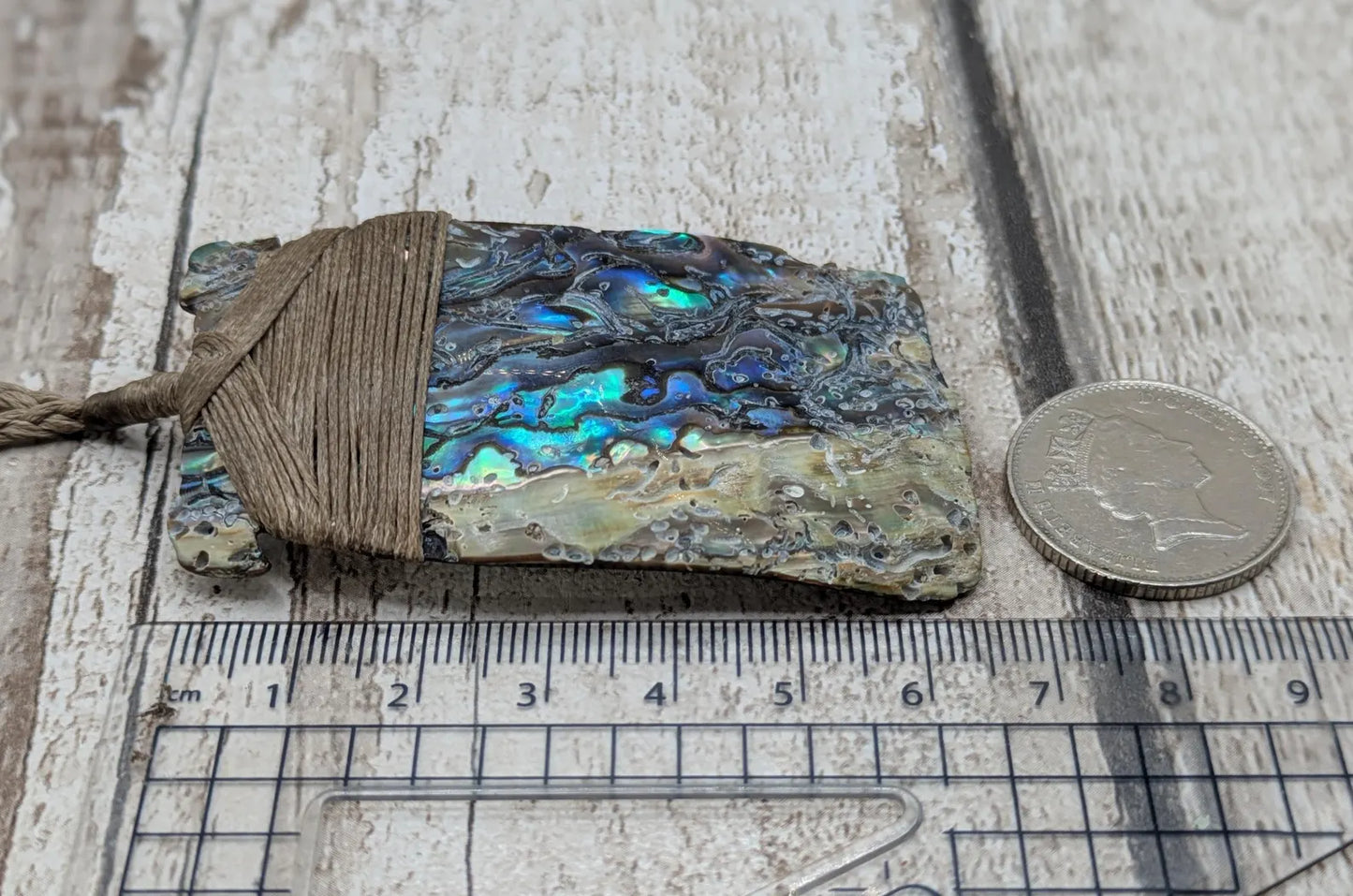 Wild New Zealand rainbow Pāua Hei Toki adze pendant