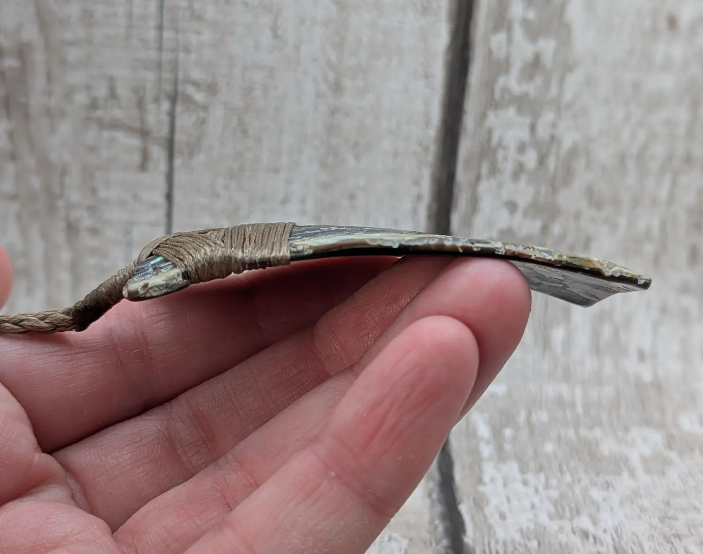 Wild New Zealand rainbow Pāua Hei Toki adze pendant