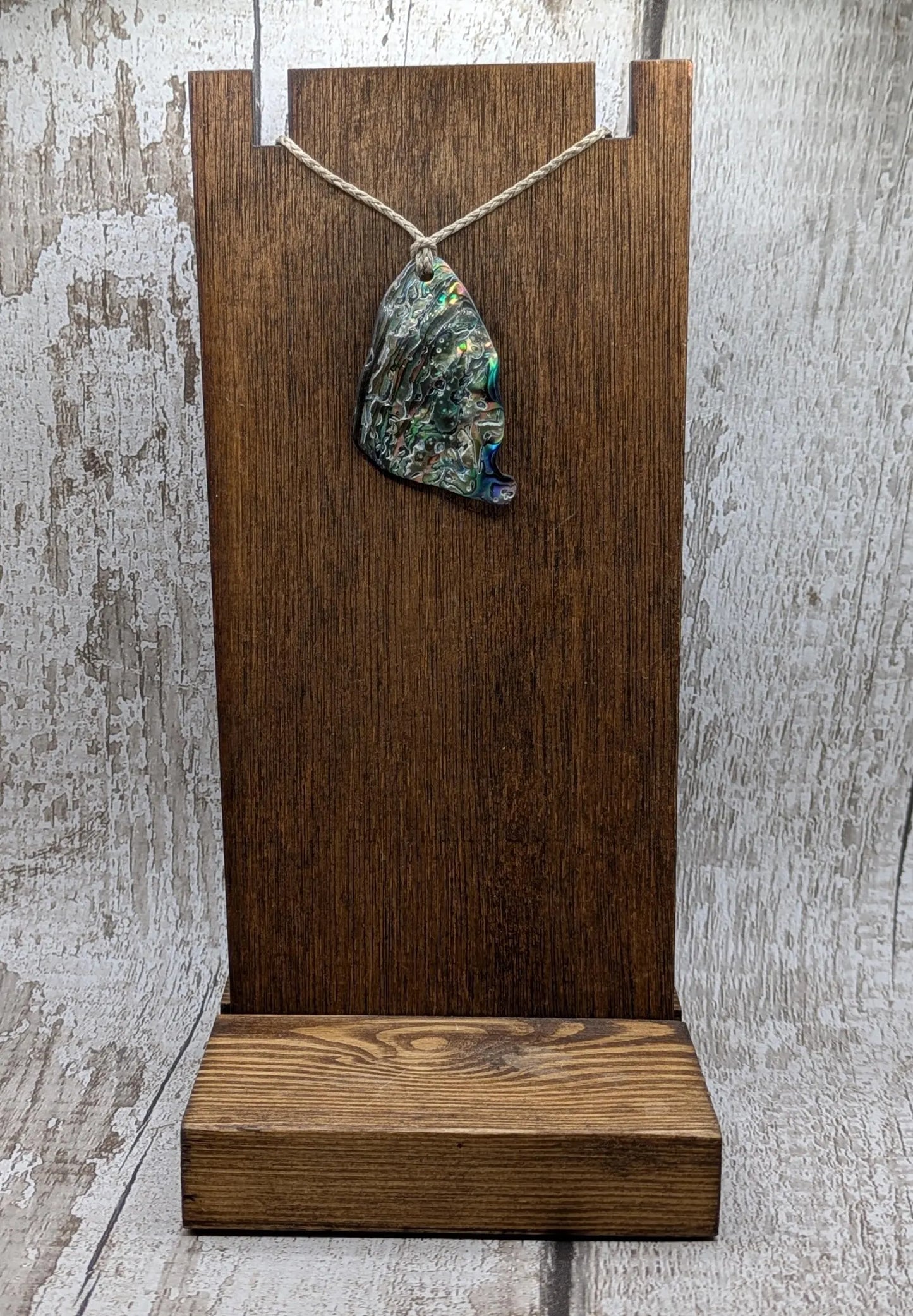 Wild natural tumbled New Zealand Pāua free form pendant.