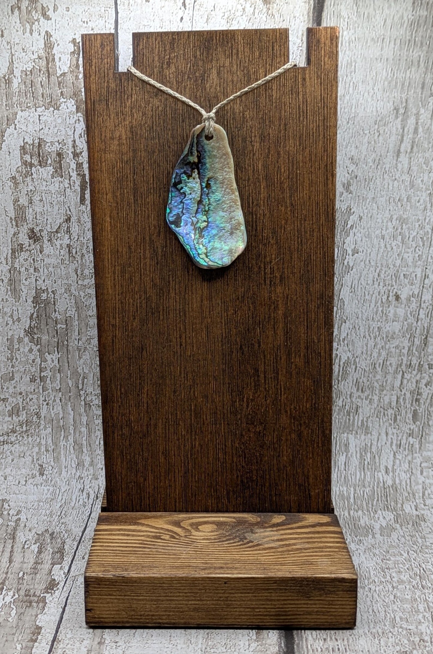 Wild New Zealand naturally tumbled rainbow Pāua shell free form.