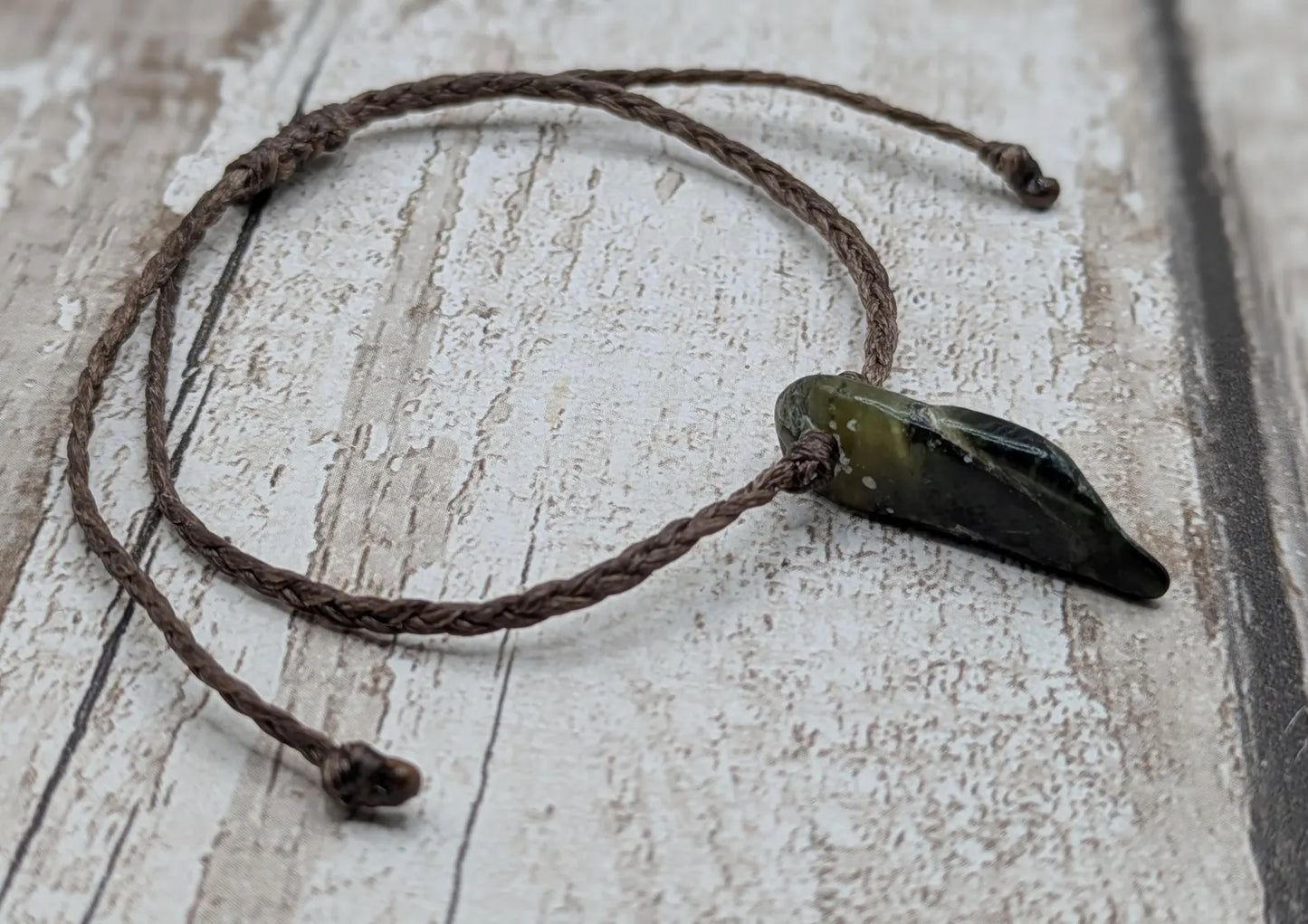 Adjustable New Zealand tumbled Pounamu greenstone jade bracelet.