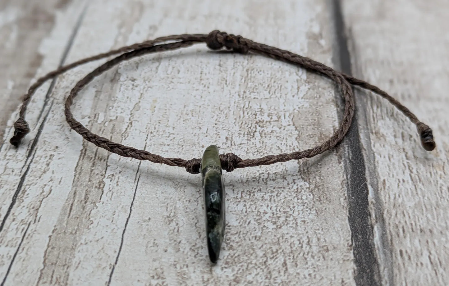 Adjustable New Zealand tumbled Pounamu greenstone jade bracelet.
